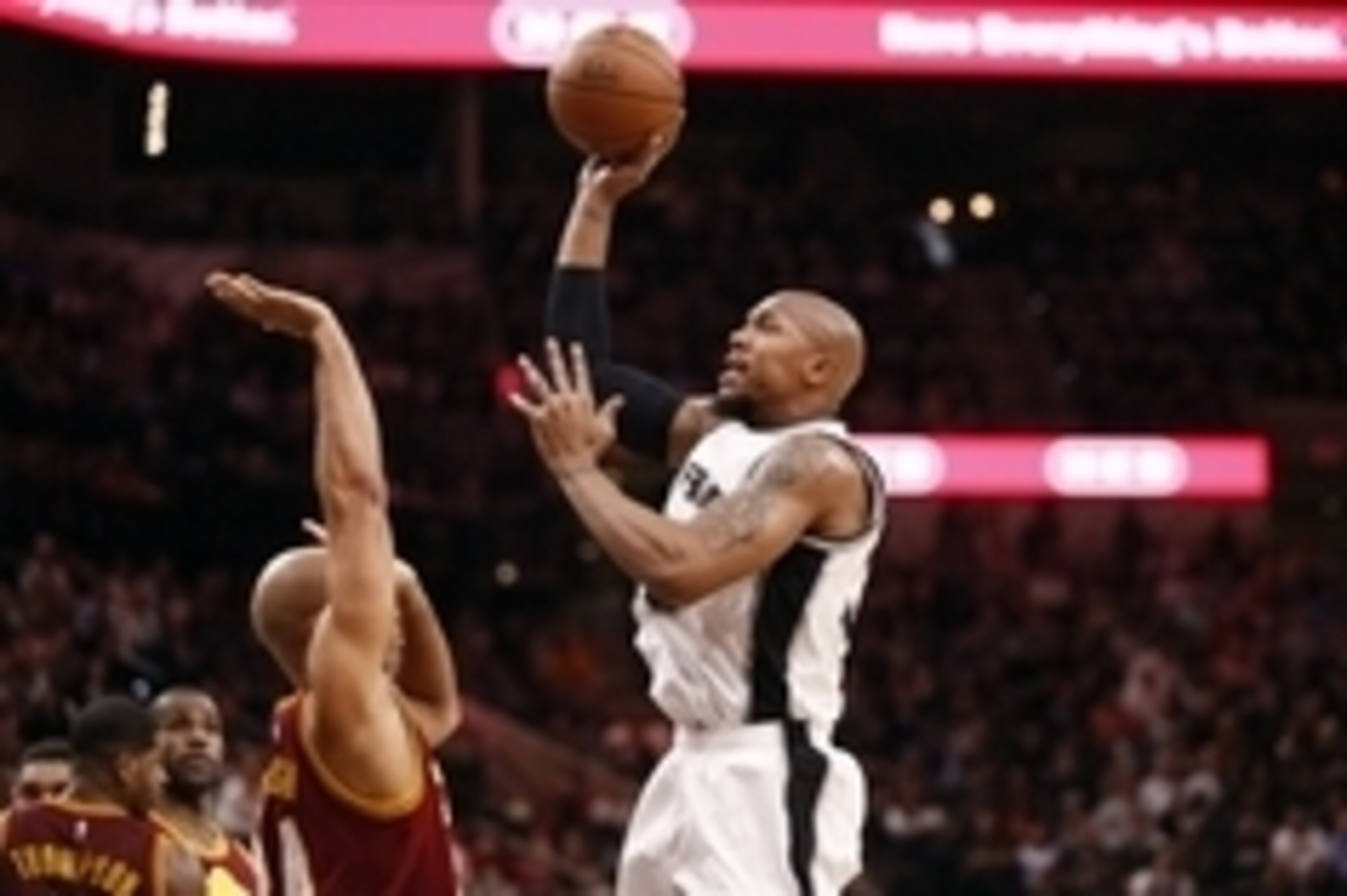 Jan 14, 2016; San Antonio, TX, USA; San Antonio Spurs power forward David West (30) shoots the ball over Cleveland Cavaliers small forward Richard Jefferson (24,left) during the first half at AT&T Center. Mandatory Credit: Soobum Im-USA TODAY Sports