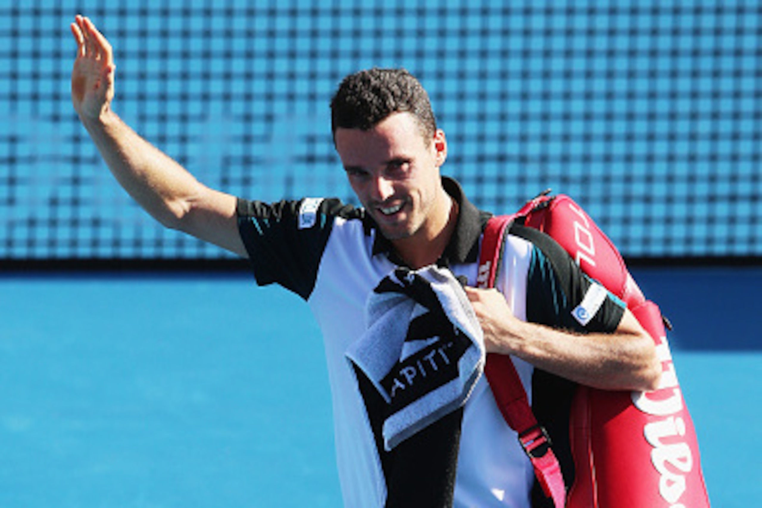 AUCKLAND, NEW ZEALAND - JANUARY 14:  Roberto Bautista of Spain celebrates after winning his second round singles match against John Isner of USA during the 2016 ASB Classic at the ASB Tennis Arena on January 14, 2016 in Auckland, New Zealand.  (Photo by H