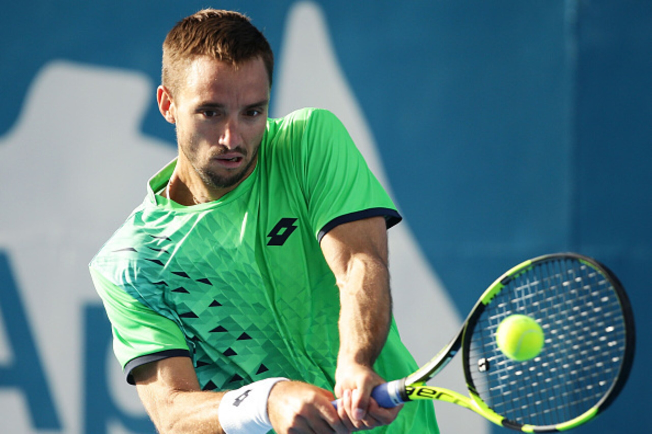 SYDNEY, AUSTRALIA - JANUARY 15: Viktor Troicki of Serbia plays a backhand in his semi final match against Teymuraz Gabashvili of Russia during day six of the 2016 Sydney International at Sydney Olympic Park Tennis Centre on January 15, 2016 in Sydney, Au SYDNEY, AUSTRALIA - JANUARY 15: Viktor Troicki of Serbia plays a backhand in his semi final match against Teymuraz Gabashvili of Russia during day six of the 2016 Sydney International at Sydney Olympic Park Tennis Centre on January 15, 2016 in Sydney, Au