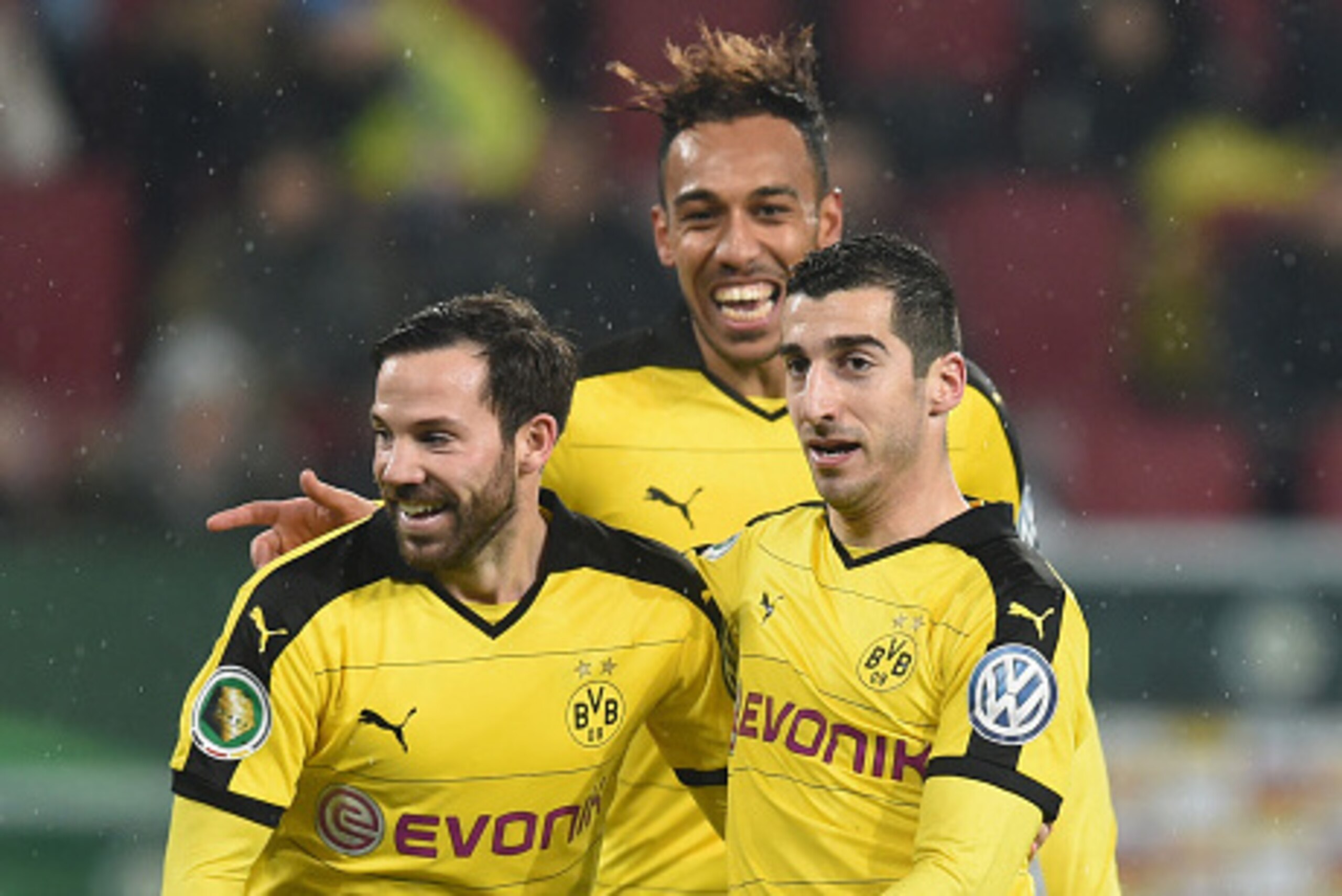 (R-L) Dortmund's Armenian midfielder Henrikh Mkhitaryan, Dortmund's Gabonese striker Pierre-Emerick Aubameyang and Dortmund's midfielder Gonzalo Castro celebrate after a second goal during the German Cup DFB Pokal third round match between Borussia Dortmu (R-L) Dortmund's Armenian midfielder Henrikh Mkhitaryan, Dortmund's Gabonese striker Pierre-Emerick Aubameyang and Dortmund's midfielder Gonzalo Castro celebrate after a second goal during the German Cup DFB Pokal third round match between Borussia Dortmu