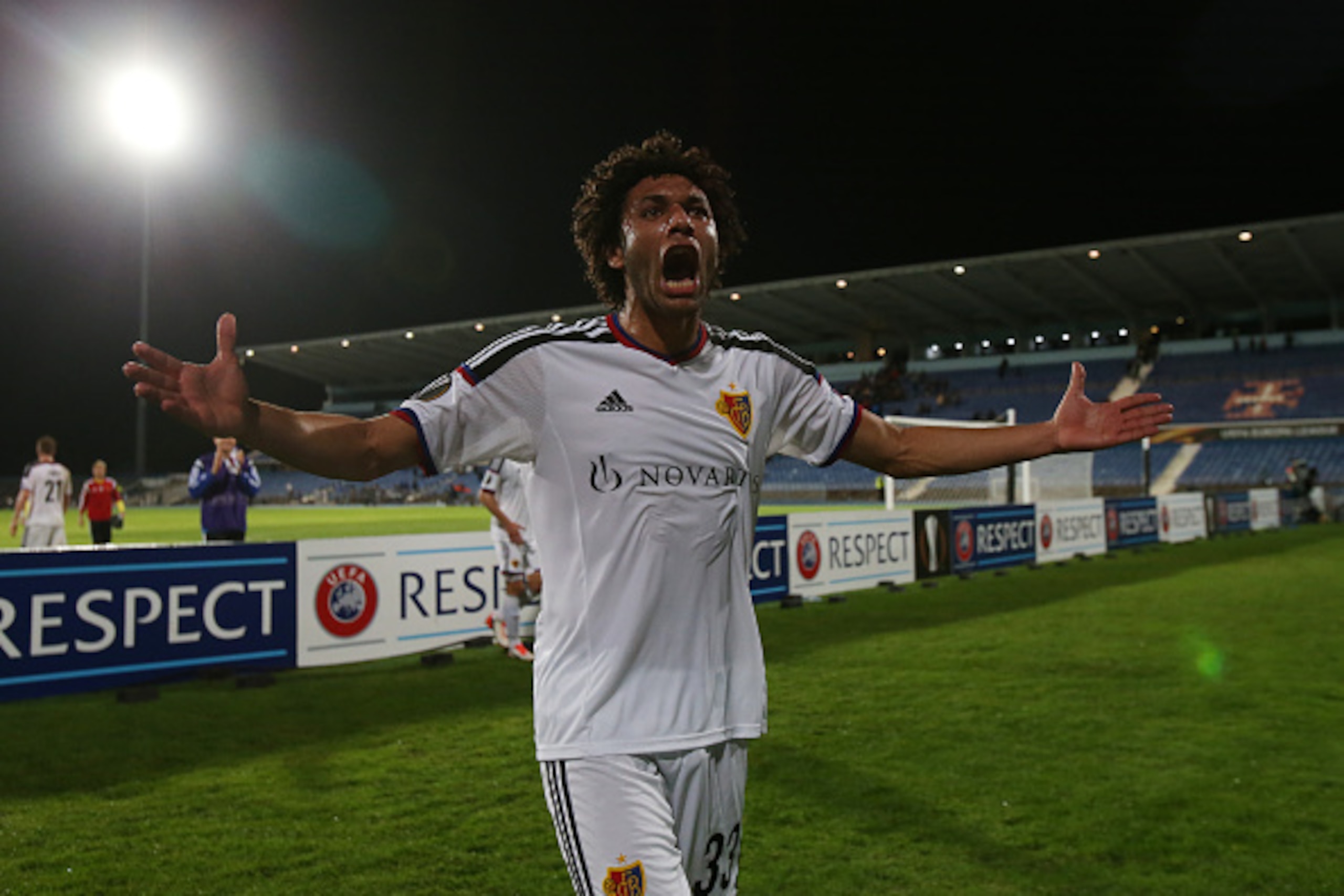 LISBON, PORTUGAL - NOVEMBER 5:  FC Basel 1893's midfielder Mohamed Elneny celebrates at the end of the UEFA Europa League match between Os Belenenses and FC Basel 1893 at Estadio do Restelo on November 5, 2015 in Lisbon, Portugal.  (Photo by Gualter Fatia