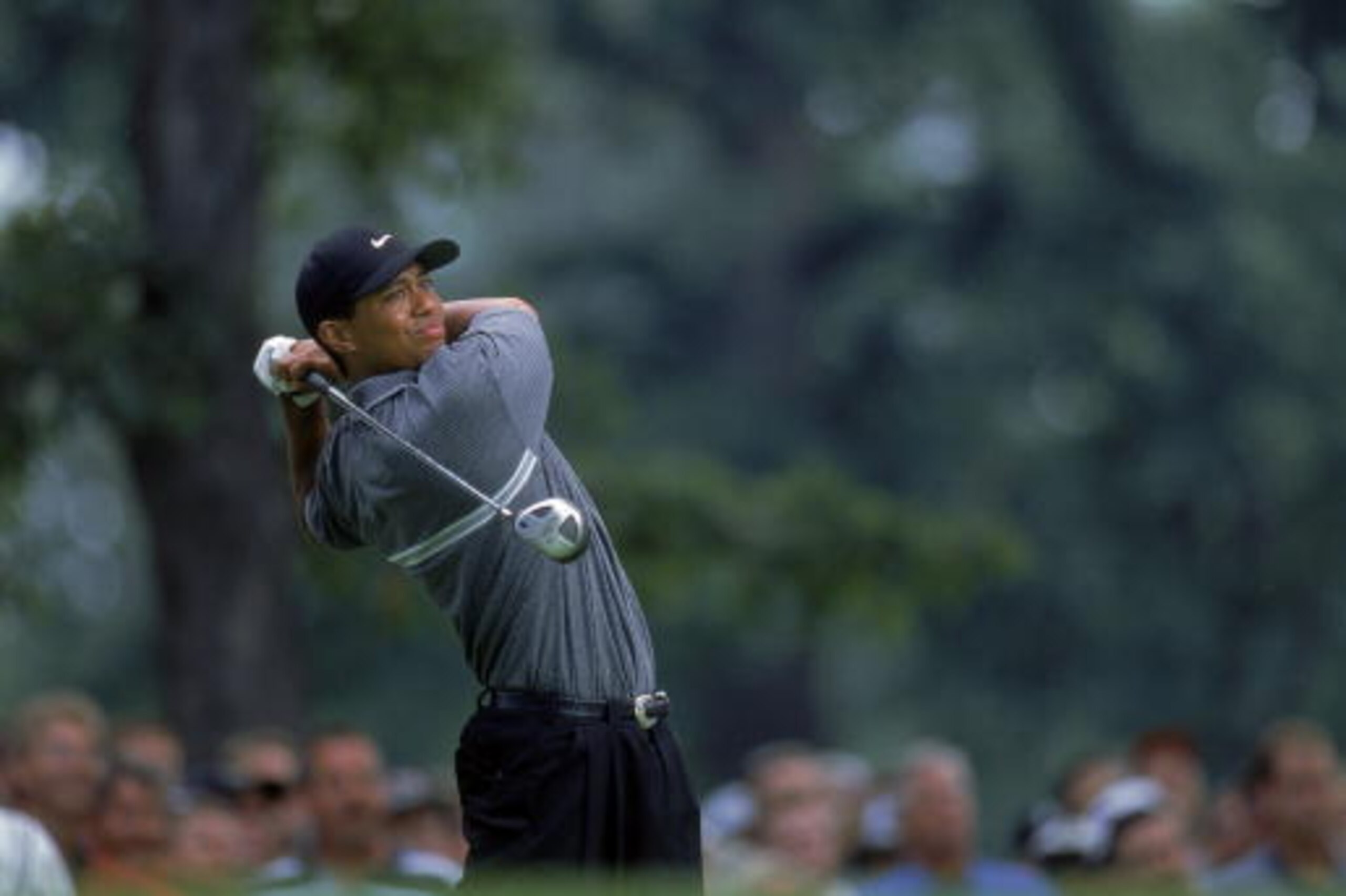 11 Aug 2000:  Tiger Woods watches the ball after swinging during the Buick Open, part of the PGA Tour at the Warwick Hills Country Club in Grand Blanc, Michigan.Mandatory Credit: Jamie Squire  /Allsport