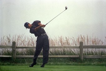 15 Jun 2000:  Tiger Woods clips his ball during the 100th U.S. Open at the Pebble Beach Golf Club in Pebble Beach, California.Mandatory Credit: Jamie Squire  /Allsport