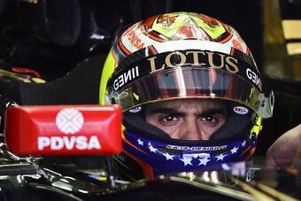 Venezuelan Lotus driver Pastor Maldonado is pictured in the pits during the second free practice of the F1 Mexico Grand Prix at the Hermanos Rodriguez racetrack in Mexico City on October 30, 2015.. AFP PHOTO/RONALDO SCHEMIDT        (Photo credit should re