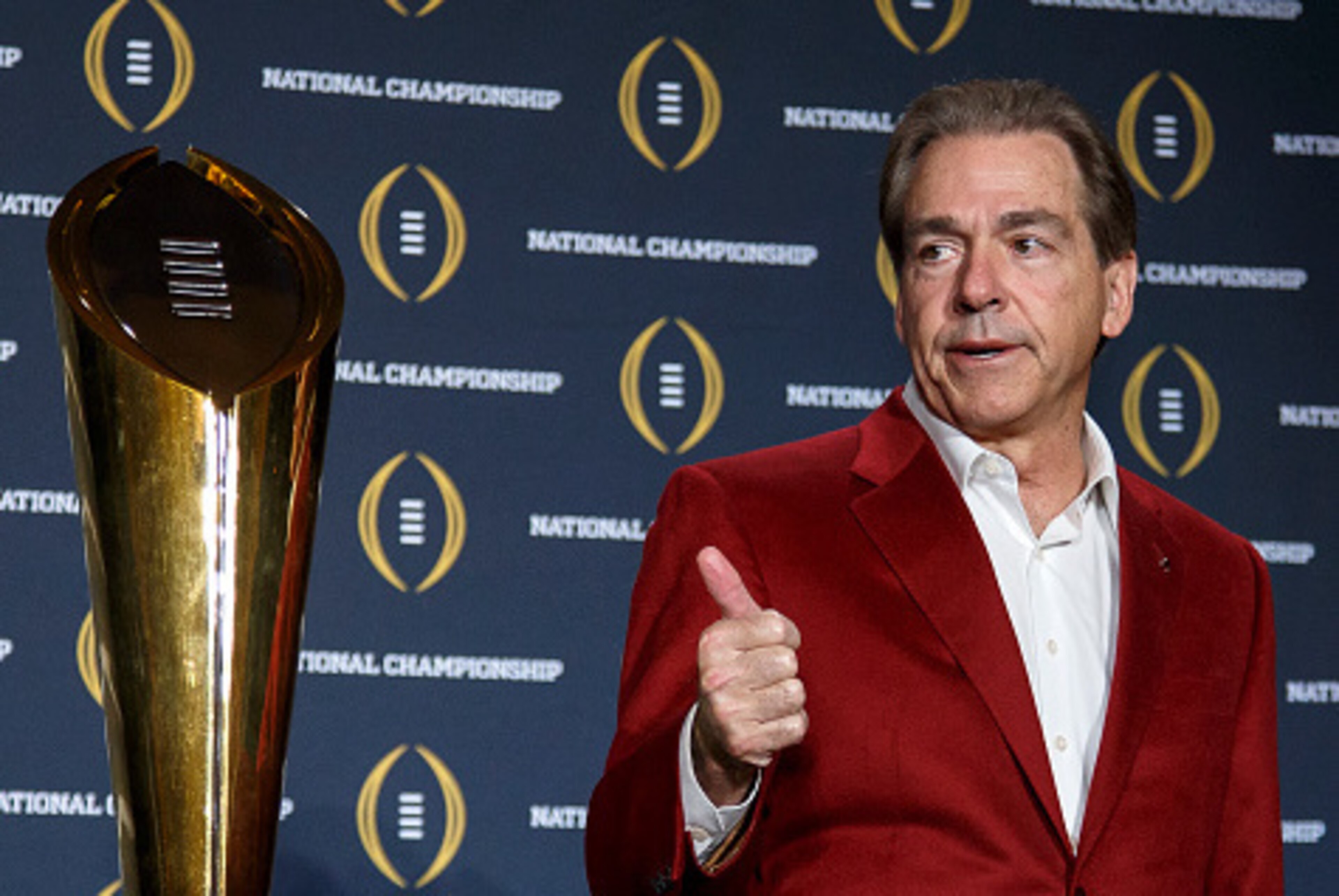 SCOTTSDALE, AZ - JANUARY 12: Head Coach Nick Saban of the Alabama Crimson Tide pose with the College Football Playoff National Championship Trophy during the MVP Press Conference after winning the College Football Playoff National Championship at the JW M SCOTTSDALE, AZ - JANUARY 12: Head Coach Nick Saban of the Alabama Crimson Tide pose with the College Football Playoff National Championship Trophy during the MVP Press Conference after winning the College Football Playoff National Championship at the JW M