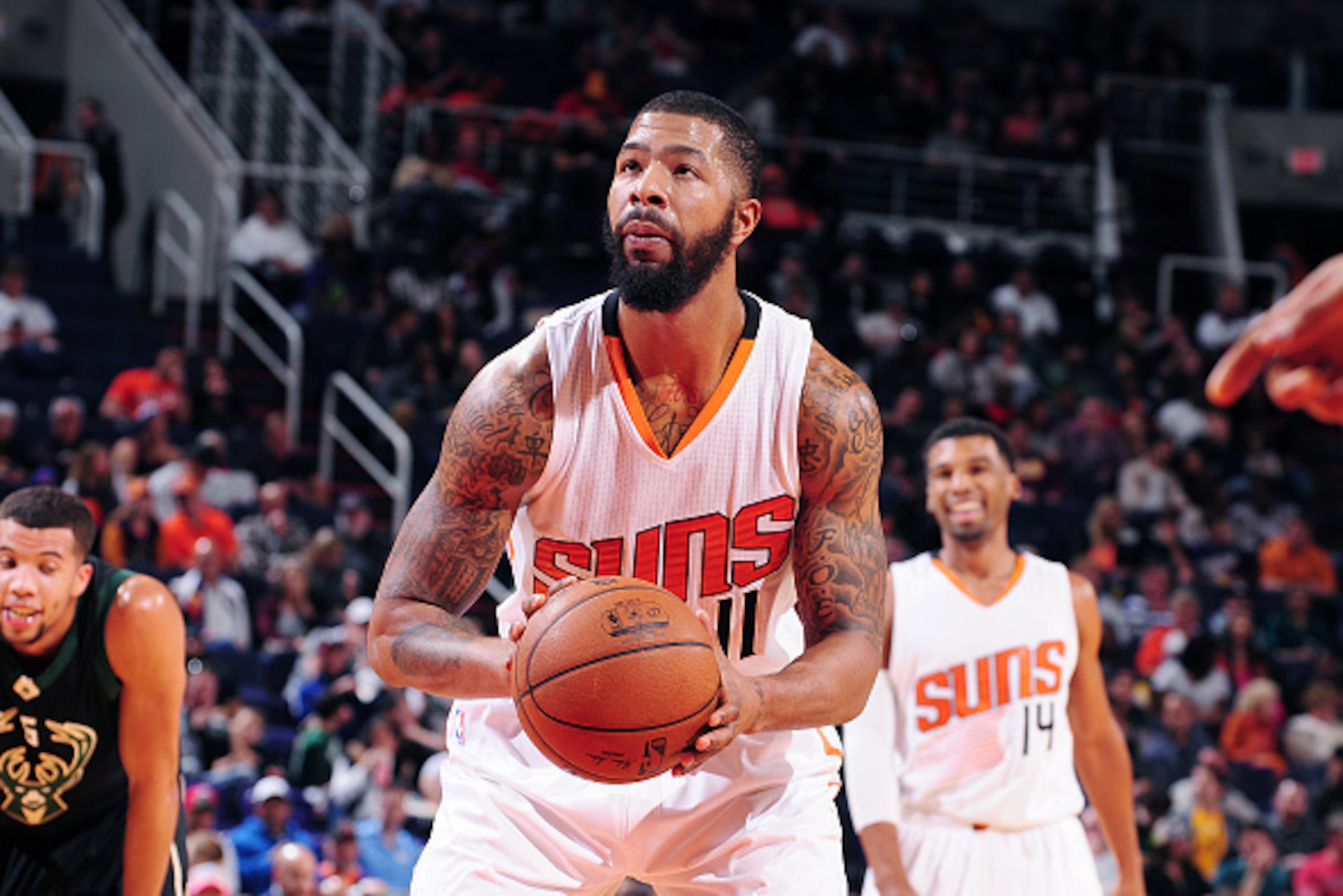 PHOENIX, AZ - DECEMBER 20: Markieff Morris #11 of the Phoenix Suns shoots a free throw during the game against the Milwaukee Bucks on December 20, 2015 at U.S. Airways Center in Phoenix, Arizona. NOTE TO USER: User expressly acknowledges and agrees that, 