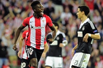 Athletic Bilbao's forward Inaki Williams Arthuer (L) celebrates after scoring during the UEFA Europa League group L football match Athletic Club Bilbao vs FK Partizan at the San Mames stadium in Bilbao on November 5, 2015.   AFP PHOTO/ ANDER GILLENEA     