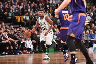 BOSTON, MA - JANUARY 15:  Marcus Smart #36 of the Boston Celtics dribbles the ball against the Phoenix Suns on January 15, 2016 at the TD Garden in Boston, Massachusetts.  NOTE TO USER: User expressly acknowledges and agrees that, by downloading and or us