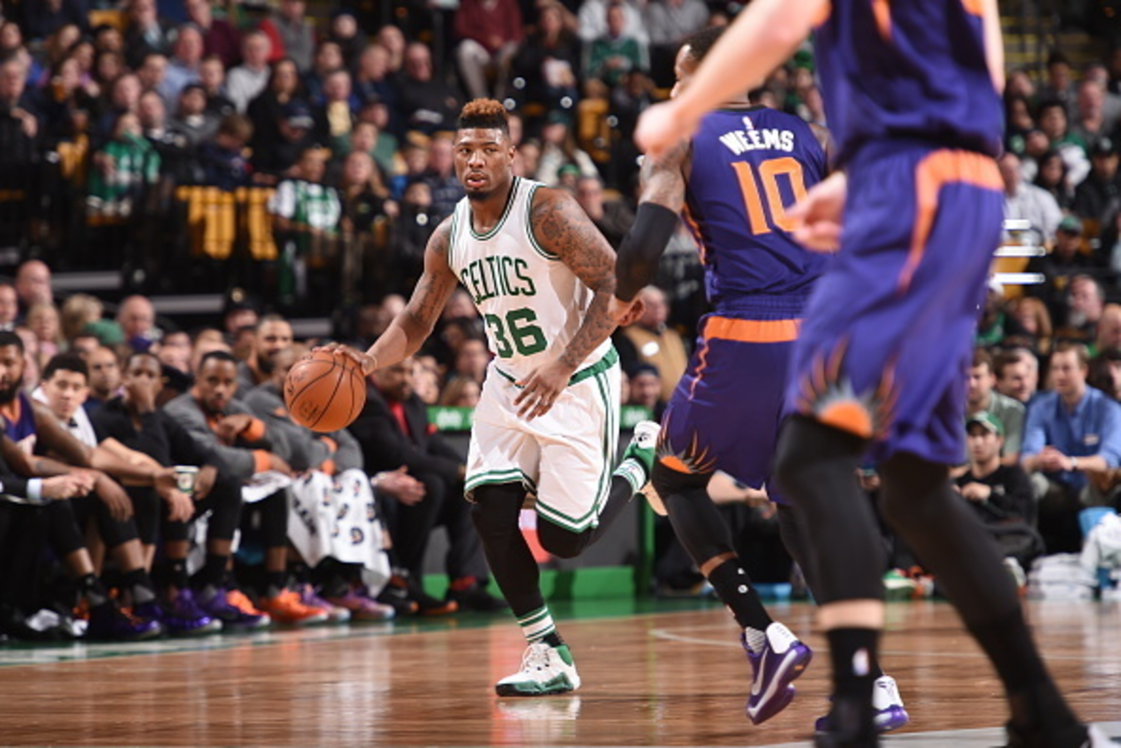 BOSTON, MA - JANUARY 15:  Marcus Smart #36 of the Boston Celtics dribbles the ball against the Phoenix Suns on January 15, 2016 at the TD Garden in Boston, Massachusetts.  NOTE TO USER: User expressly acknowledges and agrees that, by downloading and or us