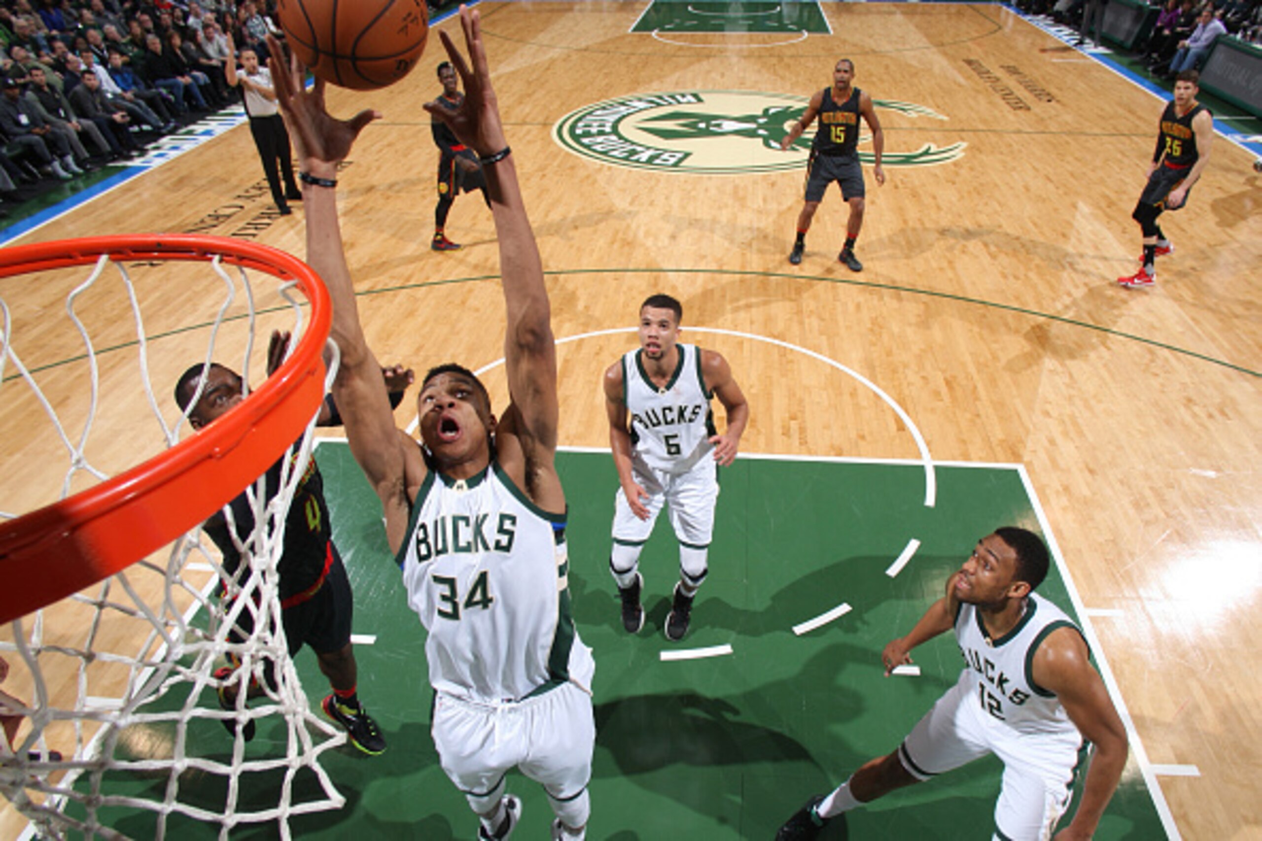 MILWAUKEE, WI - JANUARY 15: Giannis Antetokounmpo #34 of the Milwaukee Bucks grabs the rebound against the Atlanta Hawks on January 15, 2016 at the BMO Harris Bradley Center in Milwaukee, Wisconsin. NOTE TO USER: User expressly acknowledges and agrees tha