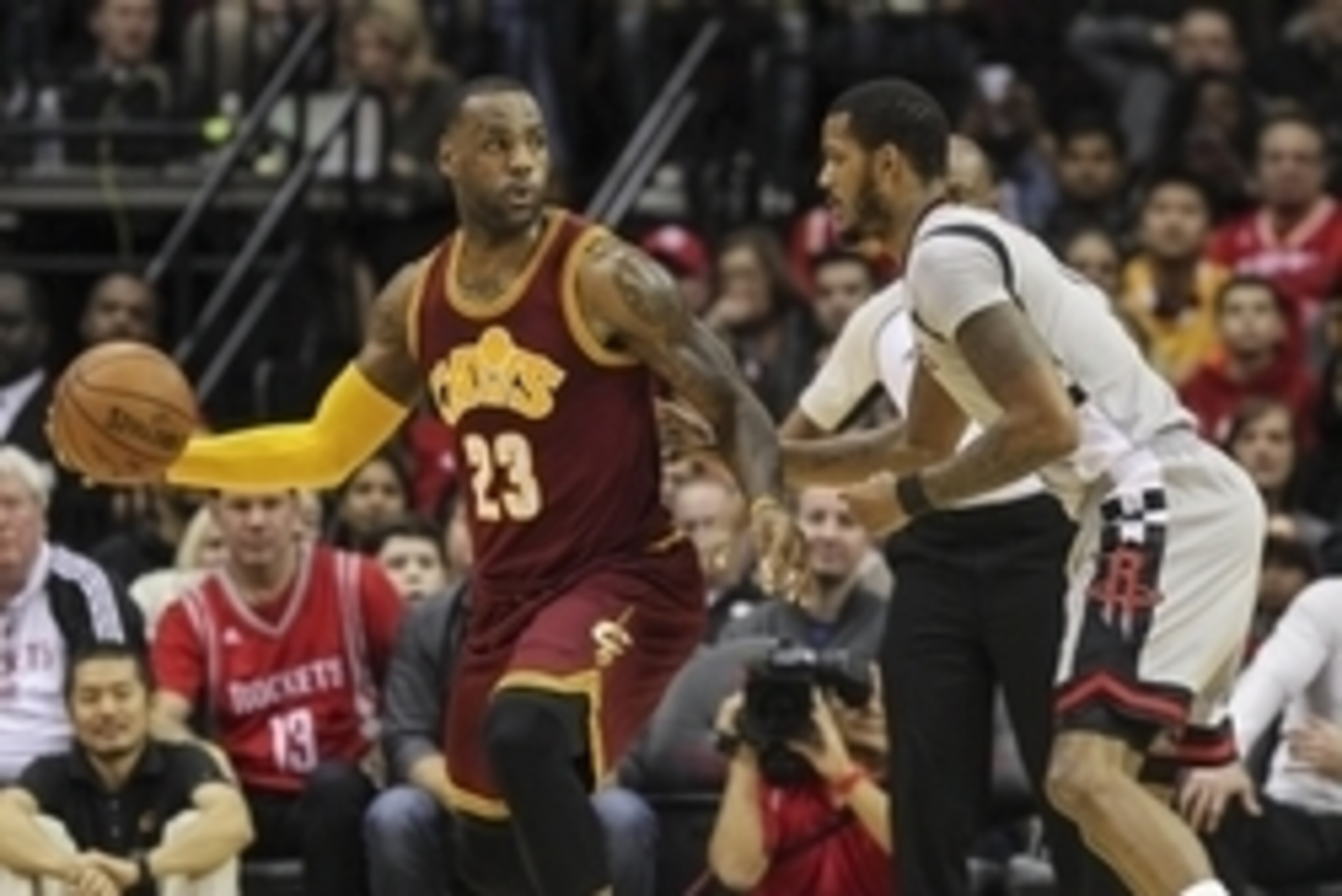 Jan 15, 2016; Houston, TX, USA; Cleveland Cavaliers forward LeBron James (23) controls the ball during the first quarter as Houston Rockets forward Trevor Ariza (1) defends at Toyota Center. Mandatory Credit: Troy Taormina-USA TODAY Sports