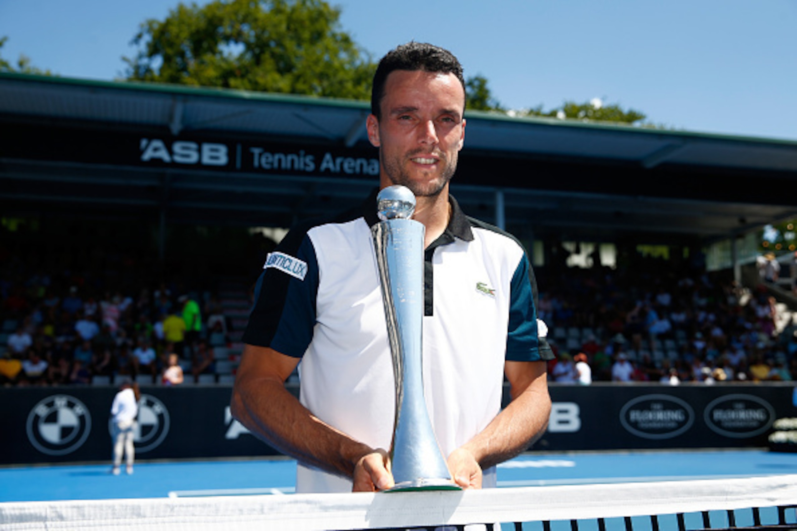 AUCKLAND, NEW ZEALAND - JANUARY 16:  Roberto Bautista Agut of Spain poses with the trophy following his singles final against Jack Sock of the USA on day six of the ASB Classic at the Stanley Street Tennis Centre on January 16, 2016 in Auckland, New Zeala