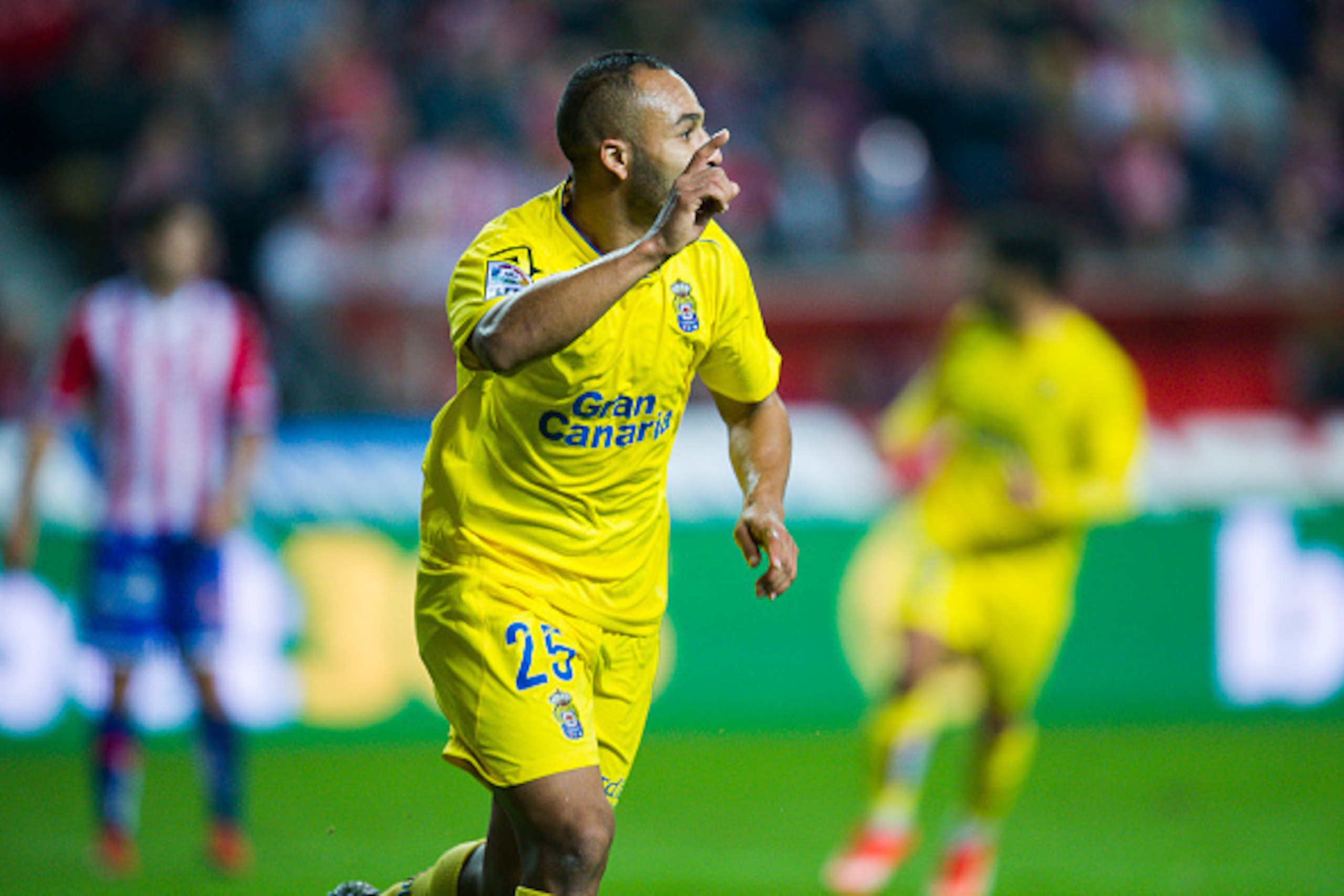 GIJON, SPAIN - DECEMBER 06:  Nabil El Zhar  of UD Las Plamas celebrates after scoring goal during the La Liga match between Real Sporting de Gijon and UD Las Plamas at Estadio El Molinon on December 6, 2015 in Gijon, Spain.  (Photo by Juan Manuel Serrano 