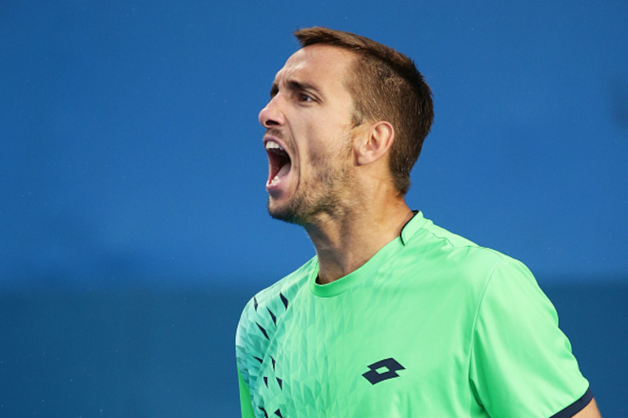 SYDNEY, AUSTRALIA - JANUARY 15:  Viktor Troicki of Serbia celebrates bringing up match point in his semi final match against Teymuraz Gabashvili of Russia during day six of the 2016 Sydney International at Sydney Olympic Park Tennis Centre on January 15, 