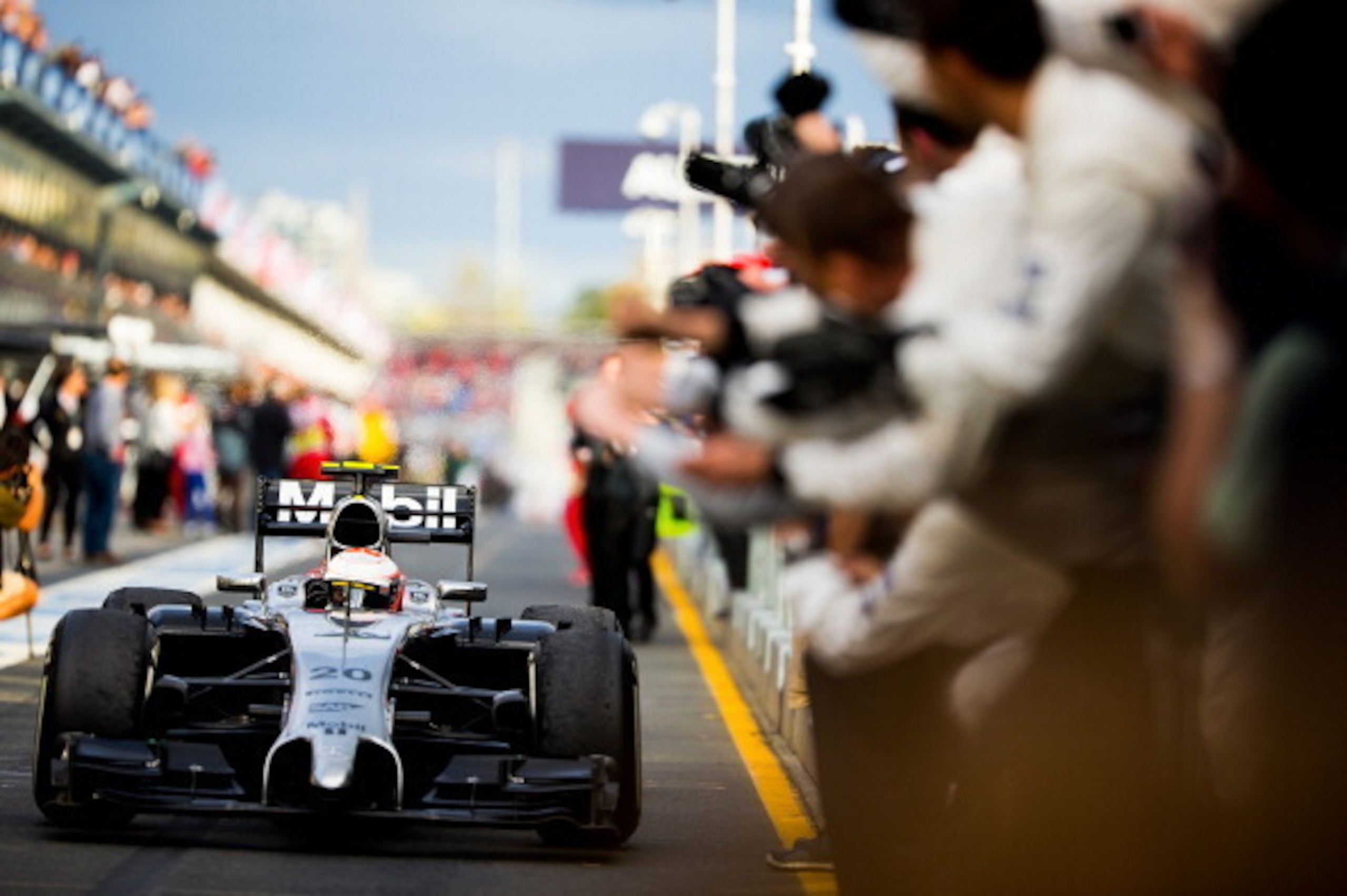 MELBOURNE, AUSTRALIA - MARCH 16:  Kevin Magnussen of Denmark and McLaren Mercedes celebrates after finishing third during the Australian Formula One Grand Prix at Albert Park on March 16, 2014 in Melbourne, Australia.  (Photo by Vladimir Rys Photography/G