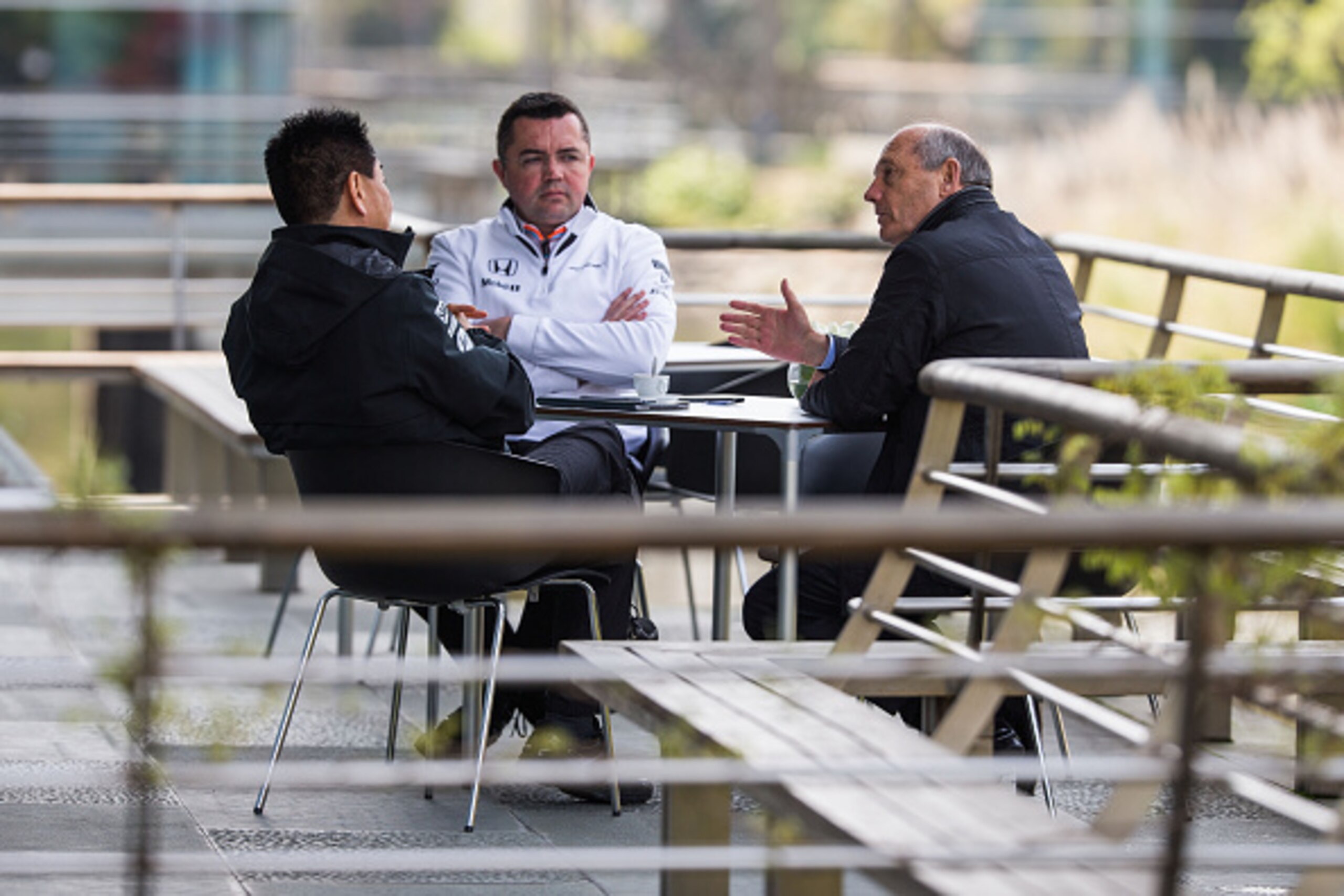 SHANGHAI, CHINA - APRIL 12:  Yasuhisa Arai of Honda and Japan chats with Ron Dennis of McLaren and Great Britain and Eric Boullier of McLaren and France during the Formula One Grand Prix of China at Shanghai International Circuit on April 12, 2015 in Shan