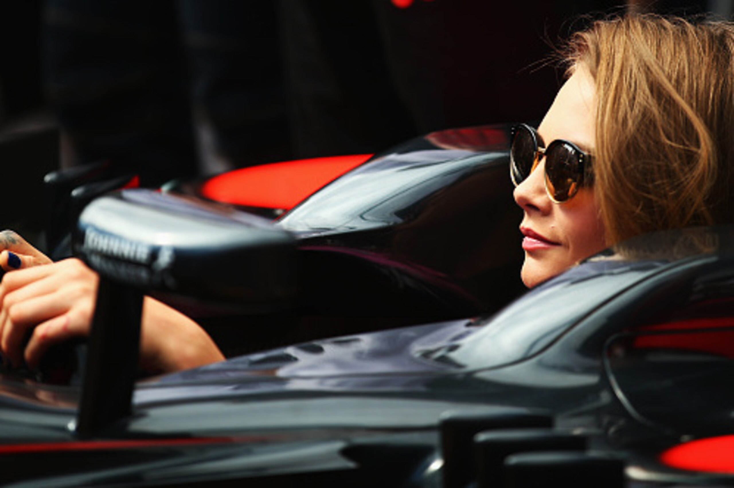 MONTE-CARLO, MONACO - MAY 24:  Model Cara Delevingne at the McLaren Honda garage in the pitlane before the Monaco Formula One Grand Prix at Circuit de Monaco on May 24, 2015 in Monte-Carlo, Monaco.  (Photo by Paul Gilham/Getty Images)