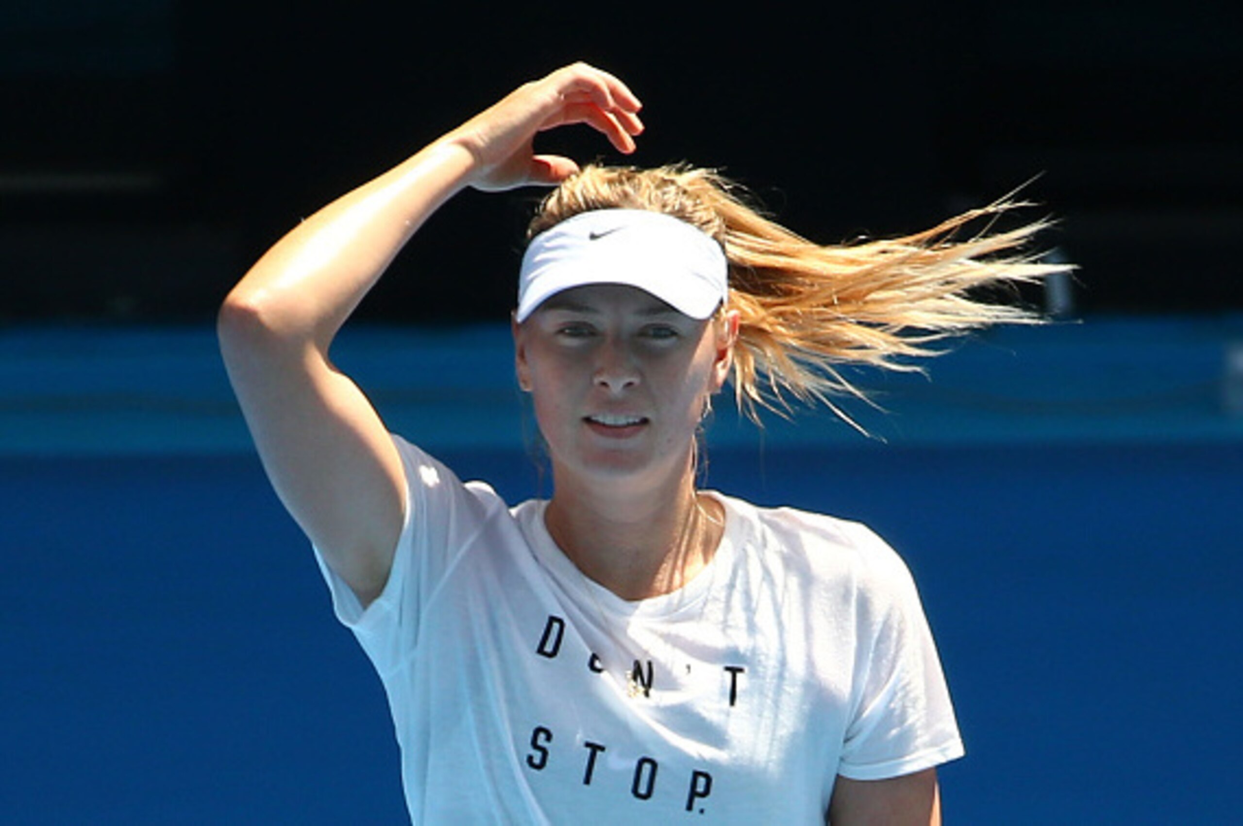 MELBOURNE, AUSTRALIA - JANUARY 12: Maria Sharapova of Russia looks on during a practice session ahead of the 2016 Australian Open at Melbourne Park on January 12, 2016 in Melbourne, Australia. (Photo by Scott Barbour/Getty Images) MELBOURNE, AUSTRALIA - JANUARY 12: Maria Sharapova of Russia looks on during a practice session ahead of the 2016 Australian Open at Melbourne Park on January 12, 2016 in Melbourne, Australia. (Photo by Scott Barbour/Getty Images)