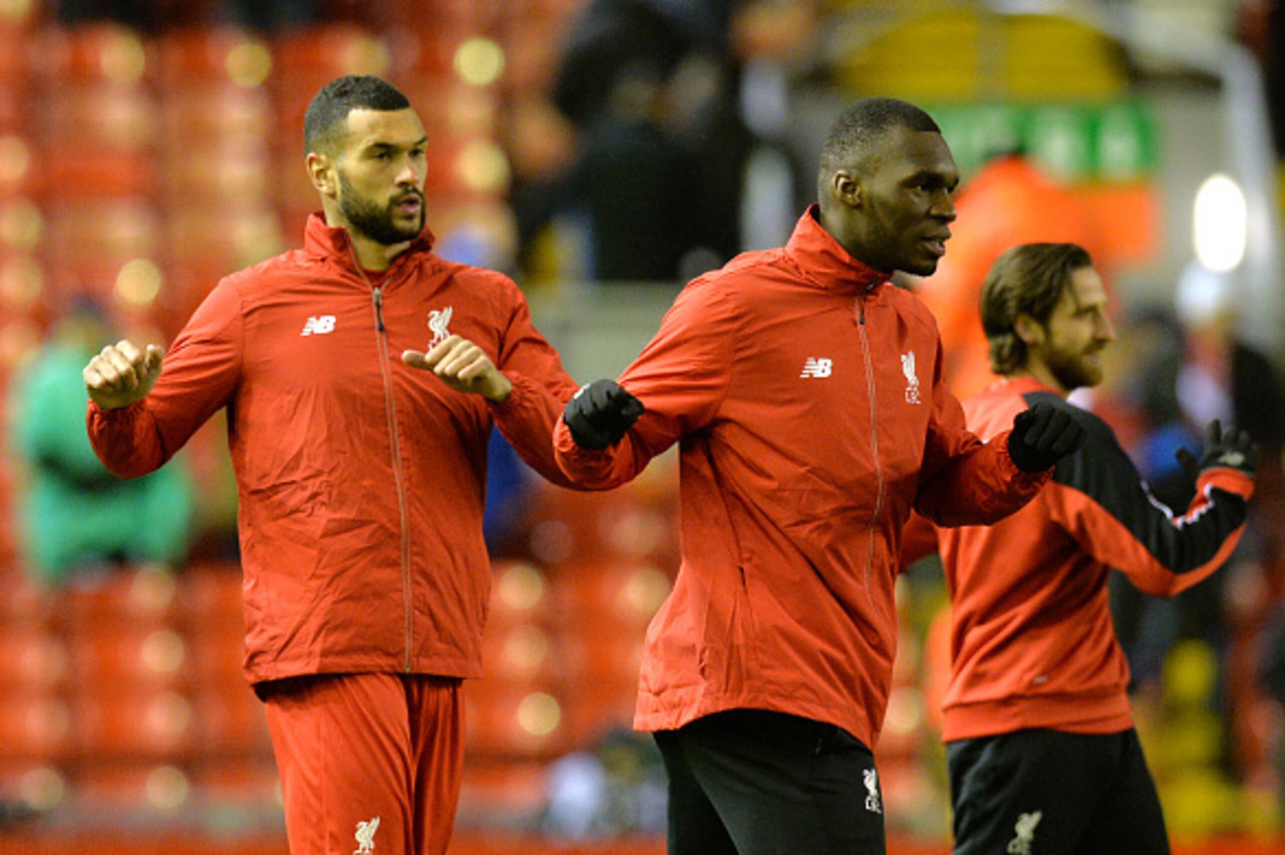 Liverpool's English defender Steven Caulker (L) and Liverpool's Zaire-born Belgian striker Christian Benteke warm up before the English Premier League football match between Liverpool and Arsenal at Anfield stadium in Liverpool, north-west England on Janu