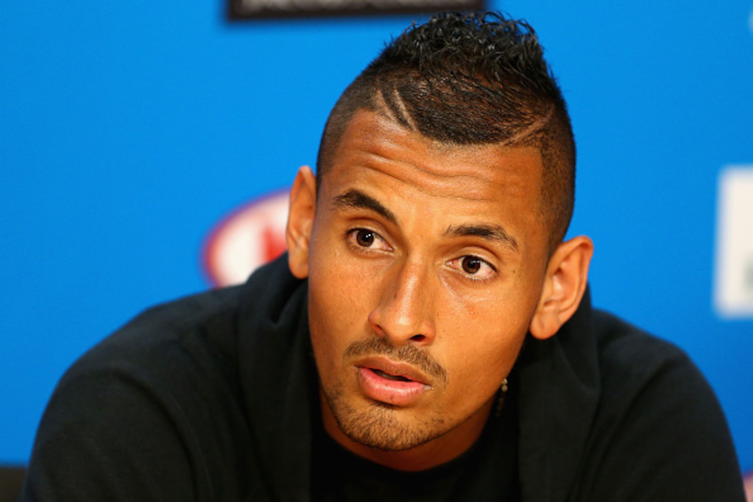 MELBOURNE, AUSTRALIA - JANUARY 16:  Nick Kyrgios of Australia speaks to media during a press conference ahead of the 2016 Australian Open at Melbourne Park on January 16, 2016 in Melbourne, Australia.  (Photo by Robert Prezioso/Getty Images)