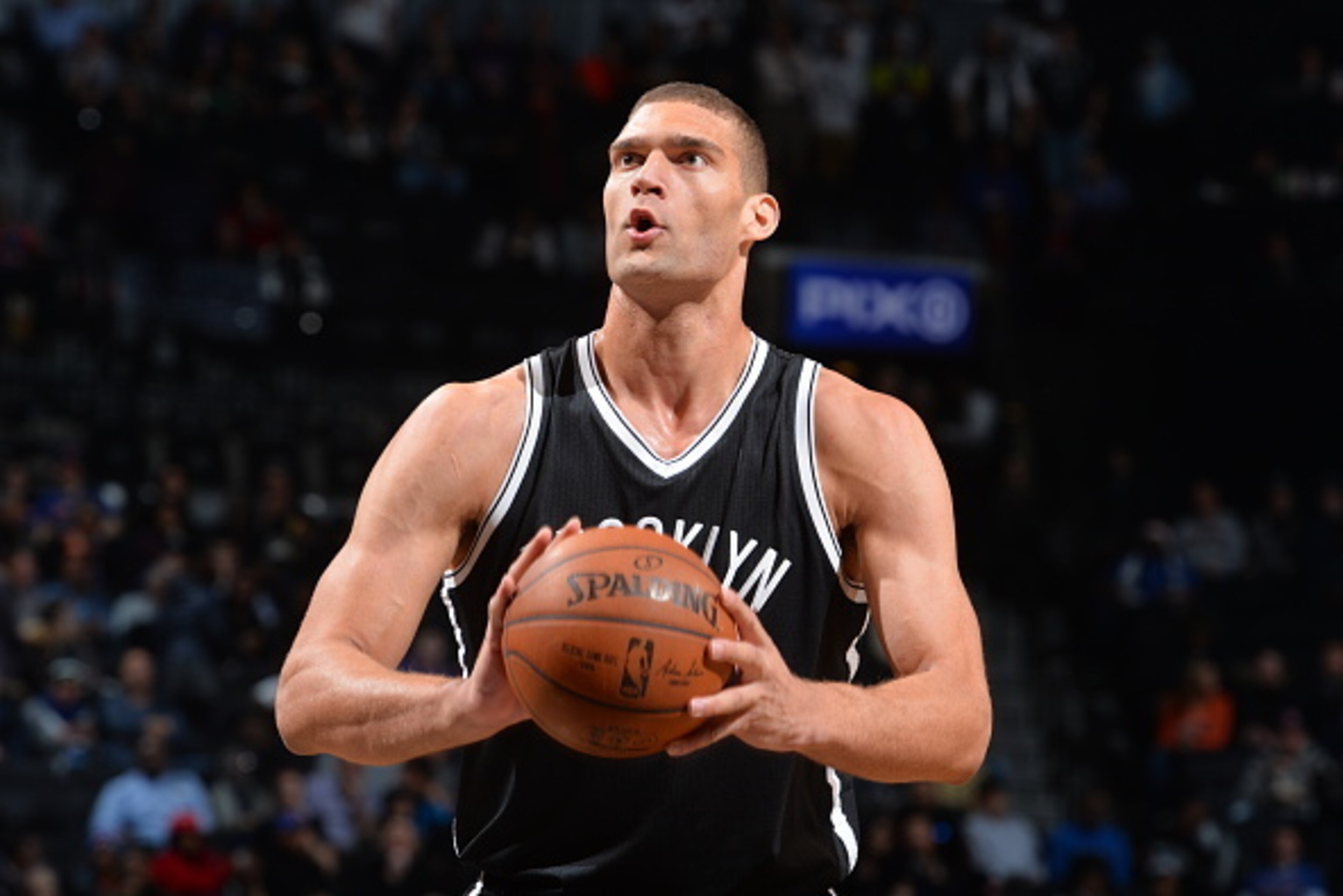 BROOKLYN, NY - JANUARY 13:  Brook Lopez #11 of the Brooklyn Nets shoots a foul shot against the New York Knicks on January 13, 2015 at Barclays Center in Brooklyn, New York. NOTE TO USER: User expressly acknowledges and agrees that, by downloading and or 