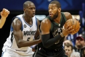 Jan 2, 2016; Minneapolis, MN, USA; Milwaukee Bucks center Greg Monroe (15) works for position around Minnesota Timberwolves center Gorgui Dieng (5) in the fourth quarter at Target Center. The Bucks win 95-85. Mandatory Credit: Bruce Kluckhohn-USA TODAY Sp