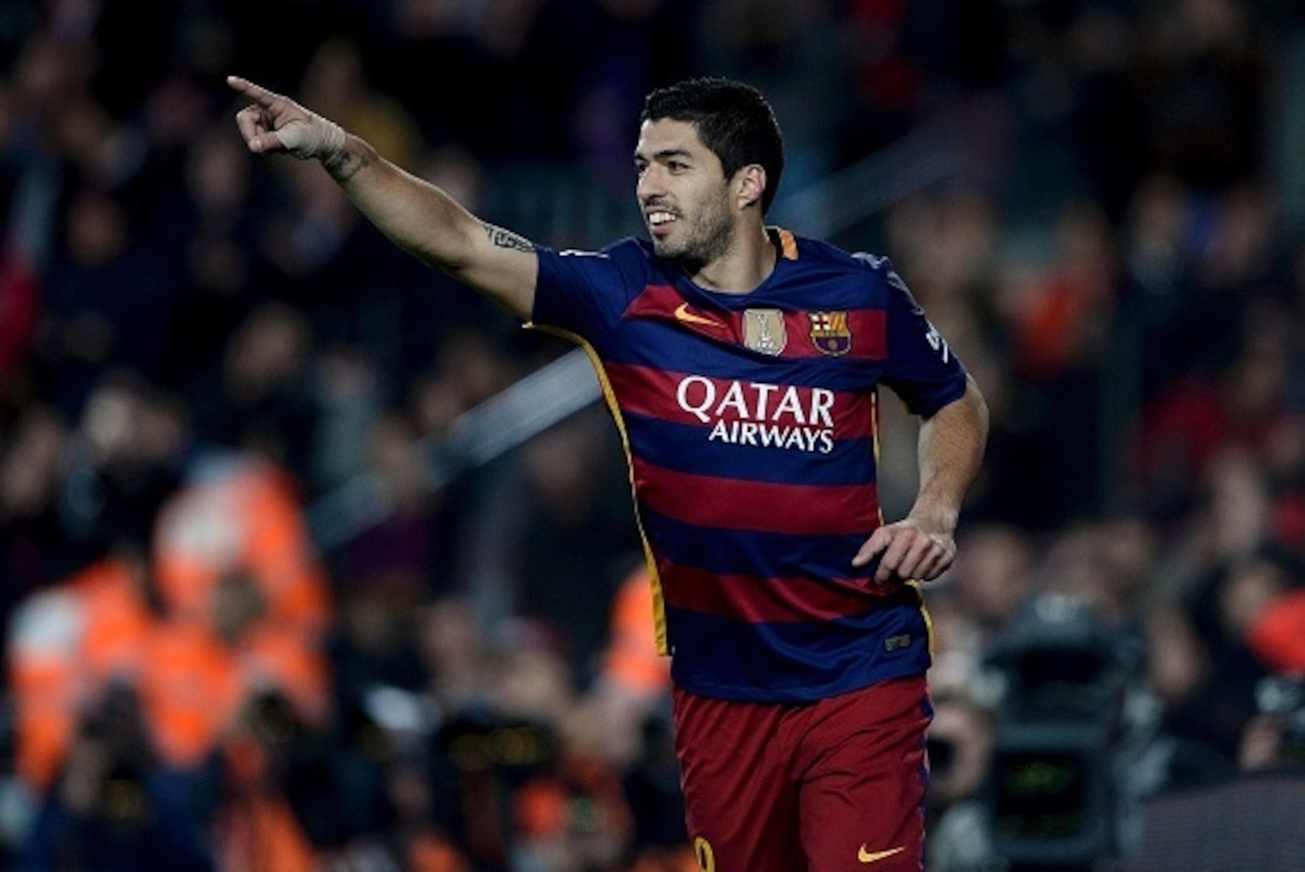 Barcelona's Uruguayan forward Luis Suarez celebrates his goal during the Spanish league football match FC Barcelona vs Athletic Club Bilbao at the Camp Nou stadium in Barcelona on January 17, 2016.   AFP PHOTO/ JOSEP LAGO / AFP / JOSEP LAGO        (Photo 