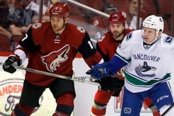 Steve Downie and Boyd Gordon in a game against vancouver