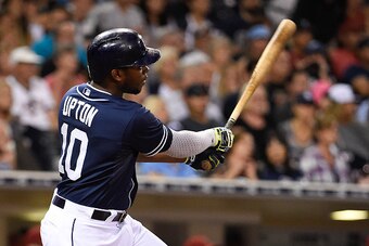 SAN DIEGO, CA - SEPTEMBER 26:  Justin Upton #10 of the San Diego Padres hits an RBI double during the eighth inning of a baseball game against the Arizona Diamondbacks at Petco Park September 26, 2015 in San Diego, California.  (Photo by Denis Poroy/Getty