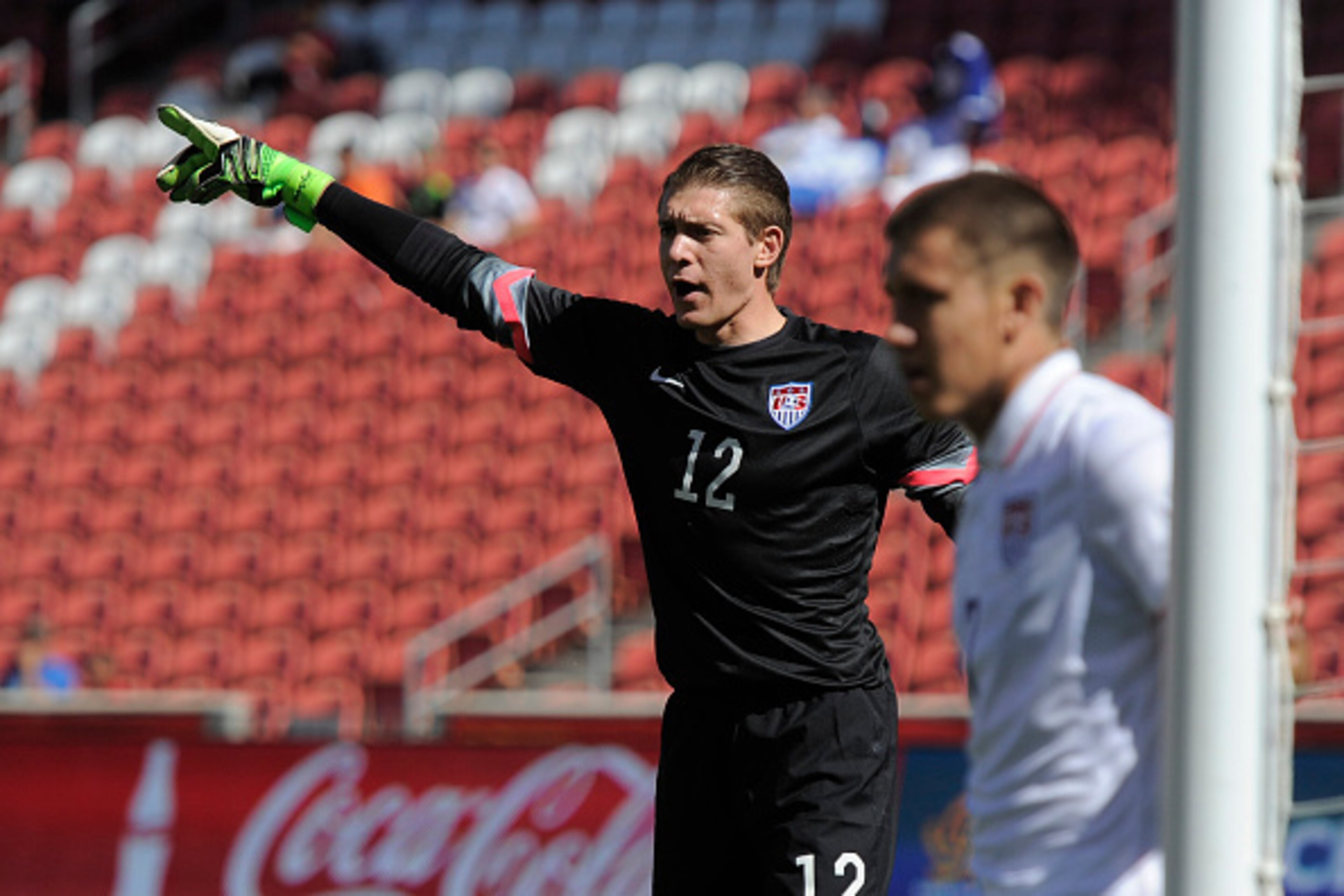 SANDY UT- OCTOBER 10: Goalie Ethan Horvath #12 of the United States gestures to his team in the first half of their game against Honduras, during the semifinal round of the 2015 CONCACAF Olympic Qualifying match at Rio Tinto Stadium on October 10, 2015 in