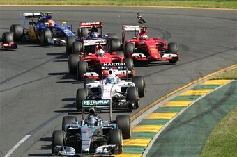 Raikkonen gets hit at the first corner of the season-opening Australian Grand Prix.