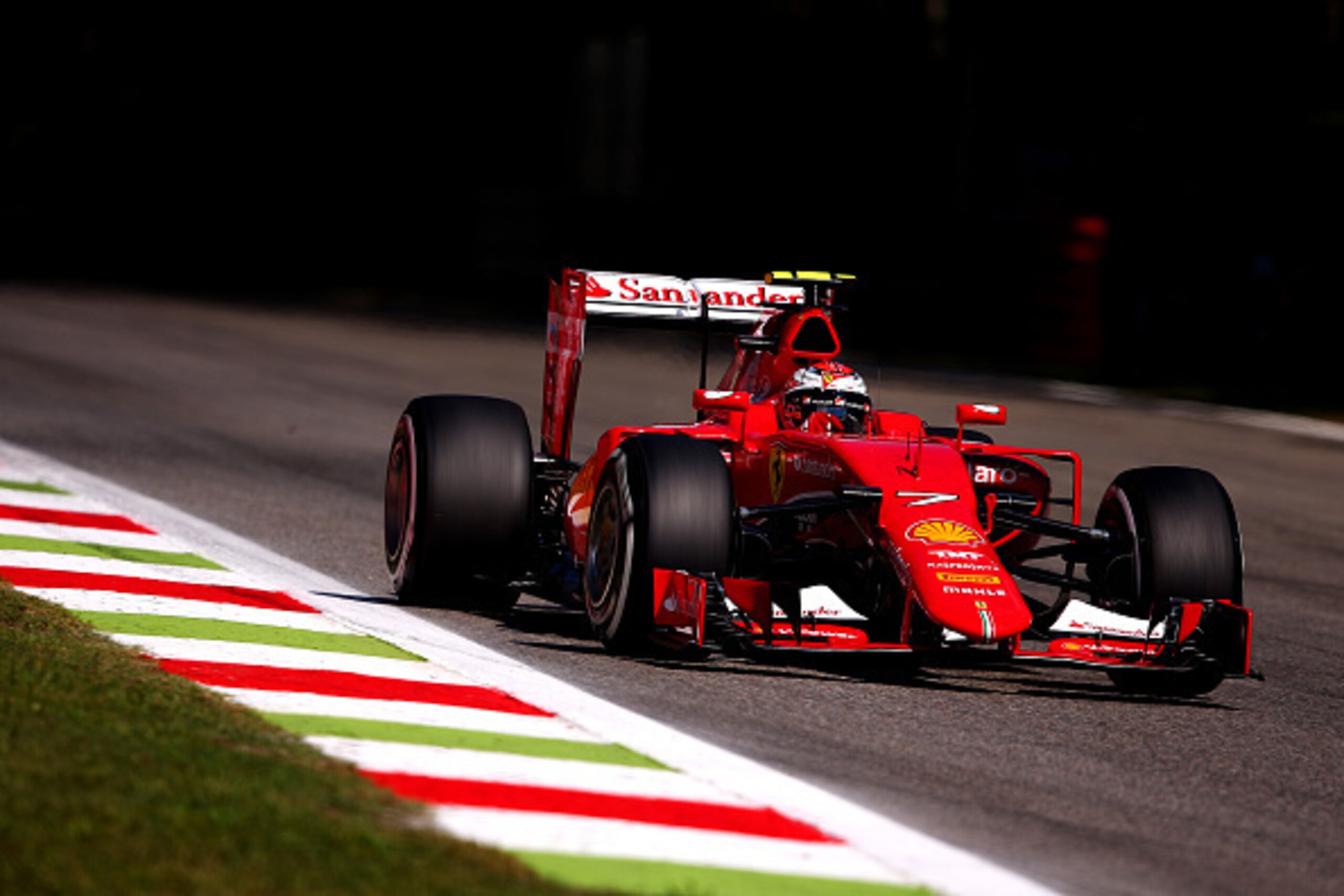 MONZA, ITALY - SEPTEMBER 05:  Kimi Raikkonen of Finland and Ferrari drives during qualifying for the Formula One Grand Prix of Italy at Autodromo di Monza on September 5, 2015 in Monza, Italy.  (Photo by Bryn Lennon/Getty Images)
