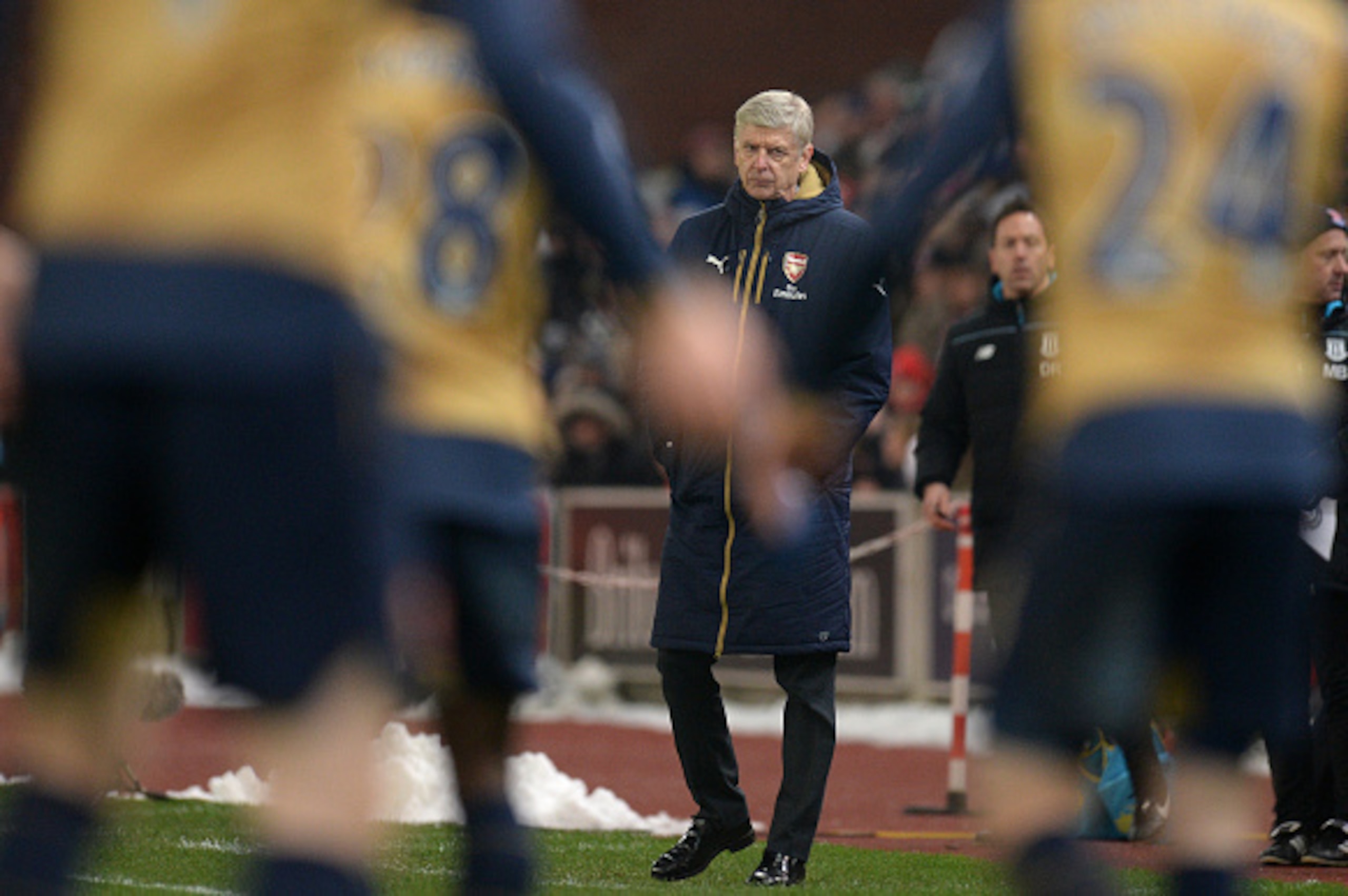 Arsenal's French manager Arsene Wenger watches his players during the English Premier League football match between Stoke City and Arsenal at the Britannia Stadium in Stoke-on-Trent, central England on January 17, 2016. AFP PHOTO / OLI SCARFF
RESTRICTED Arsenal's French manager Arsene Wenger watches his players during the English Premier League football match between Stoke City and Arsenal at the Britannia Stadium in Stoke-on-Trent, central England on January 17, 2016. AFP PHOTO / OLI SCARFF
RESTRICTED