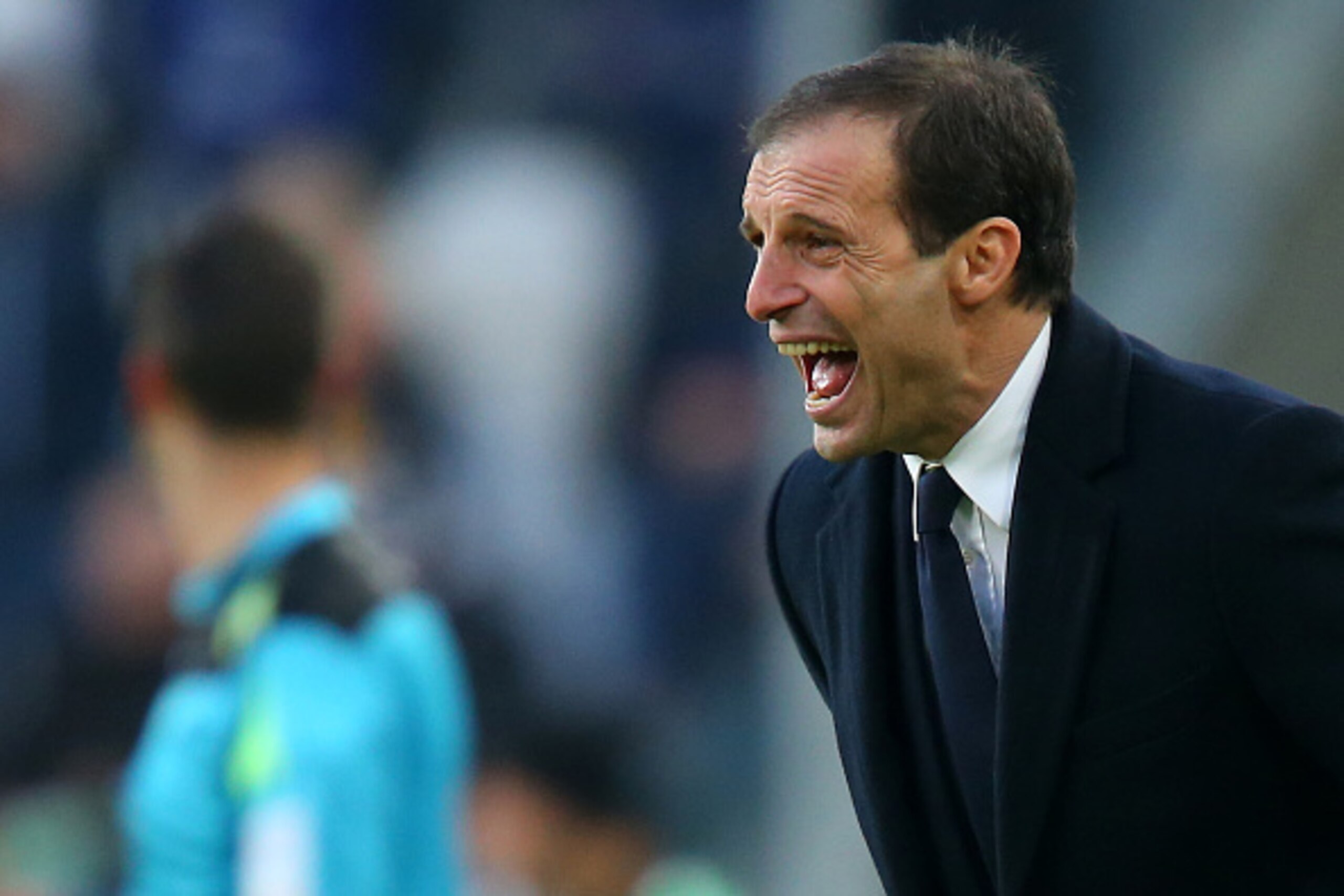 Juventus' coach Massimiliano Allegri reacts during the Italian Serie A  football match Juventus Vs Hellas Verona on January 6, 2016 at the 'Juventus Stadium' in Turin.  AFP PHOTO / MARCO BERTORELLO / AFP / MARCO BERTORELLO        (Photo credit should read