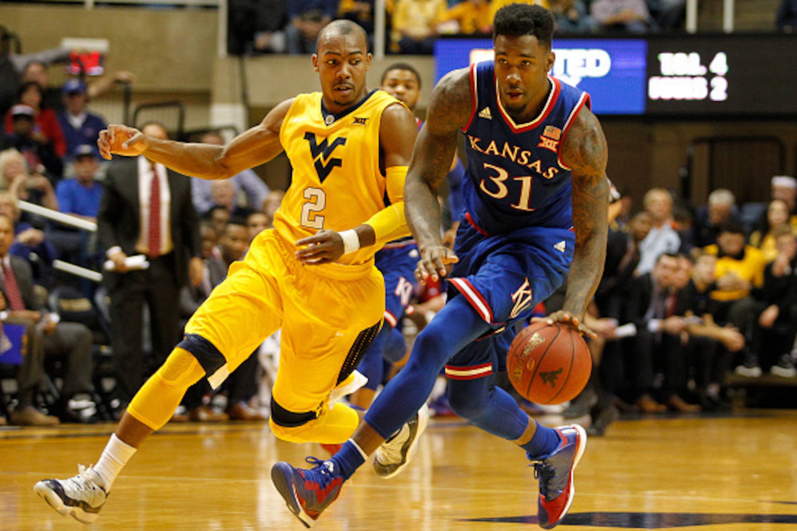 MORGANTOWN, WV - JANUARY 12:  Jamari Traylor #31 of the Kansas Jayhawks in action during the game against Jevon Carter #2 of the West Virginia Mountaineers at the WVU Coliseum on January 12, 2016 in Morgantown, West Virginia.  (Photo by Justin K. Aller/Ge