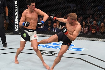 BOSTON, MA - JANUARY 17:  (R-L) TJ Dillashaw kicks the leg of Dominick Cruz in their UFC bantamweight championship bout during the UFC Fight Night event inside TD Garden on January 17, 2016 in Boston, Massachusetts. (Photo by Jeff Bottari/Zuffa LLC/Zuffa 