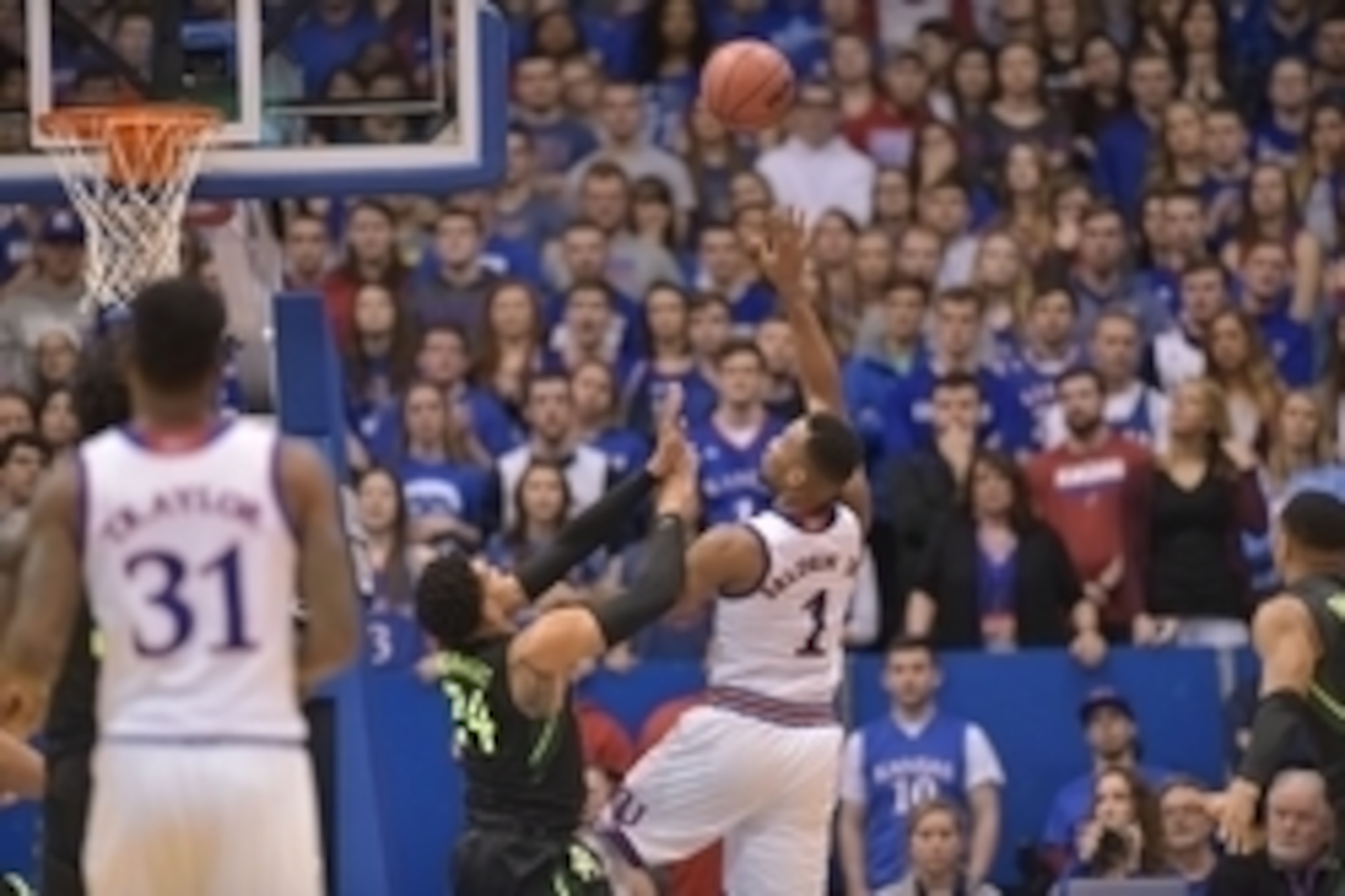Jan 2, 2016; Lawrence, KS, USA; Kansas Jayhawks guard Wayne Selden Jr. (1) scores over Baylor Bears guard Ishmail Wainright (24) during the first half at Allen Fieldhouse. Mandatory Credit: Denny Medley-USA TODAY Sports