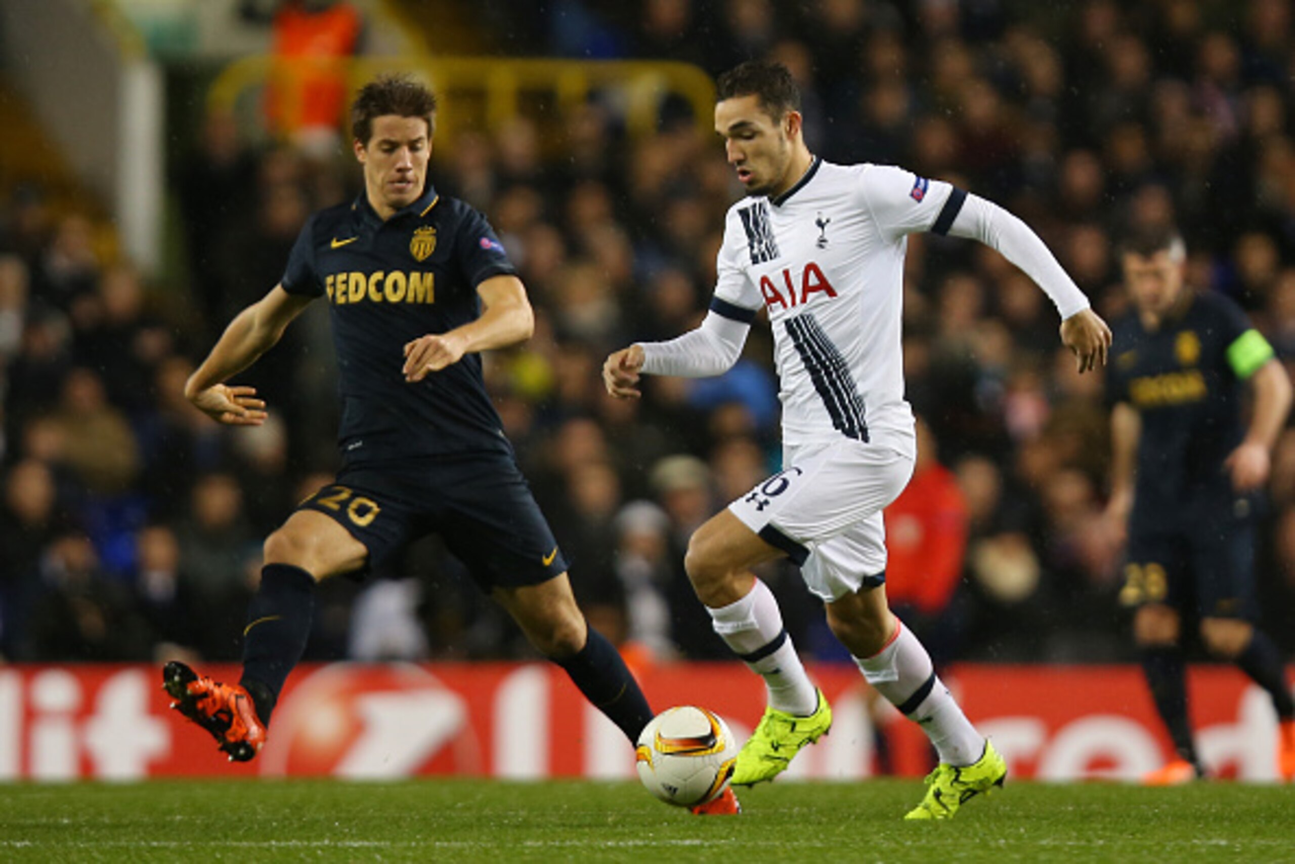 LONDON, ENGLAND - DECEMBER 10:  Nabil Bentaleb of Spurs is pursued by Mario Pasalic of Monaco during the UEFA Europa League Group J match between Tottenham Hotspur and AS Monaco at White Hart Lane on December 10, 2015 in London, United Kingdom.  (Photo by