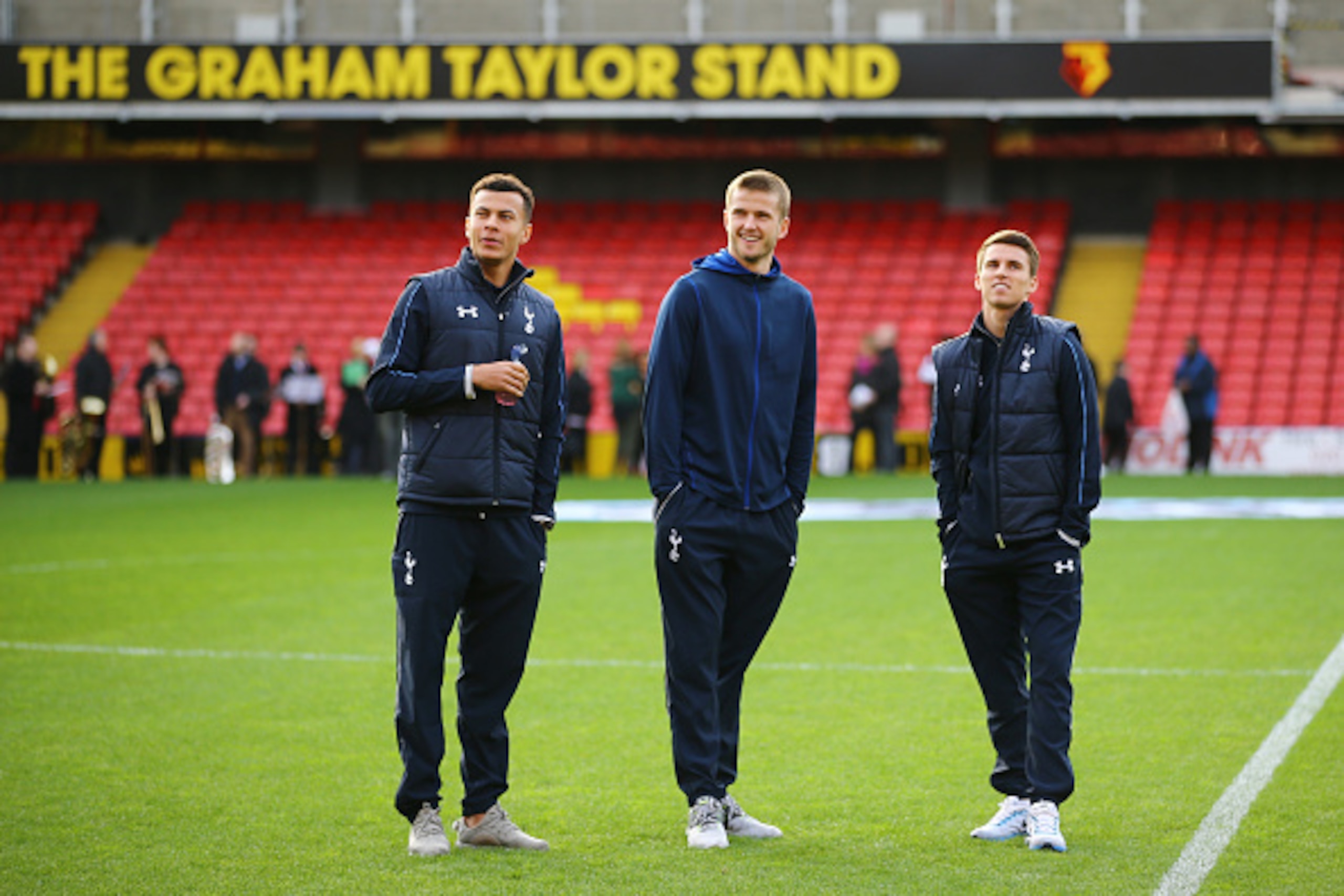 WATFORD, ENGLAND - DECEMBER 28: (L to R) Dele Alli, Eric Dier and Tom Carroll of Tottenham Hotspur inspect the pitch prior to the Barclays Premier League match between Watford and Tottenham Hotspur at Vicarage Road on December 28, 2015 in Watford, England