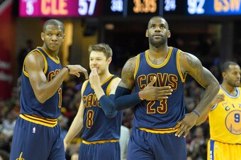 Jan 18, 2016; Cleveland, OH, USA; Cleveland Cavaliers forward LeBron James (23) reacts in the third quarter against the Golden State Warriors at Quicken Loans Arena. Mandatory Credit: David Richard-USA TODAY Sports