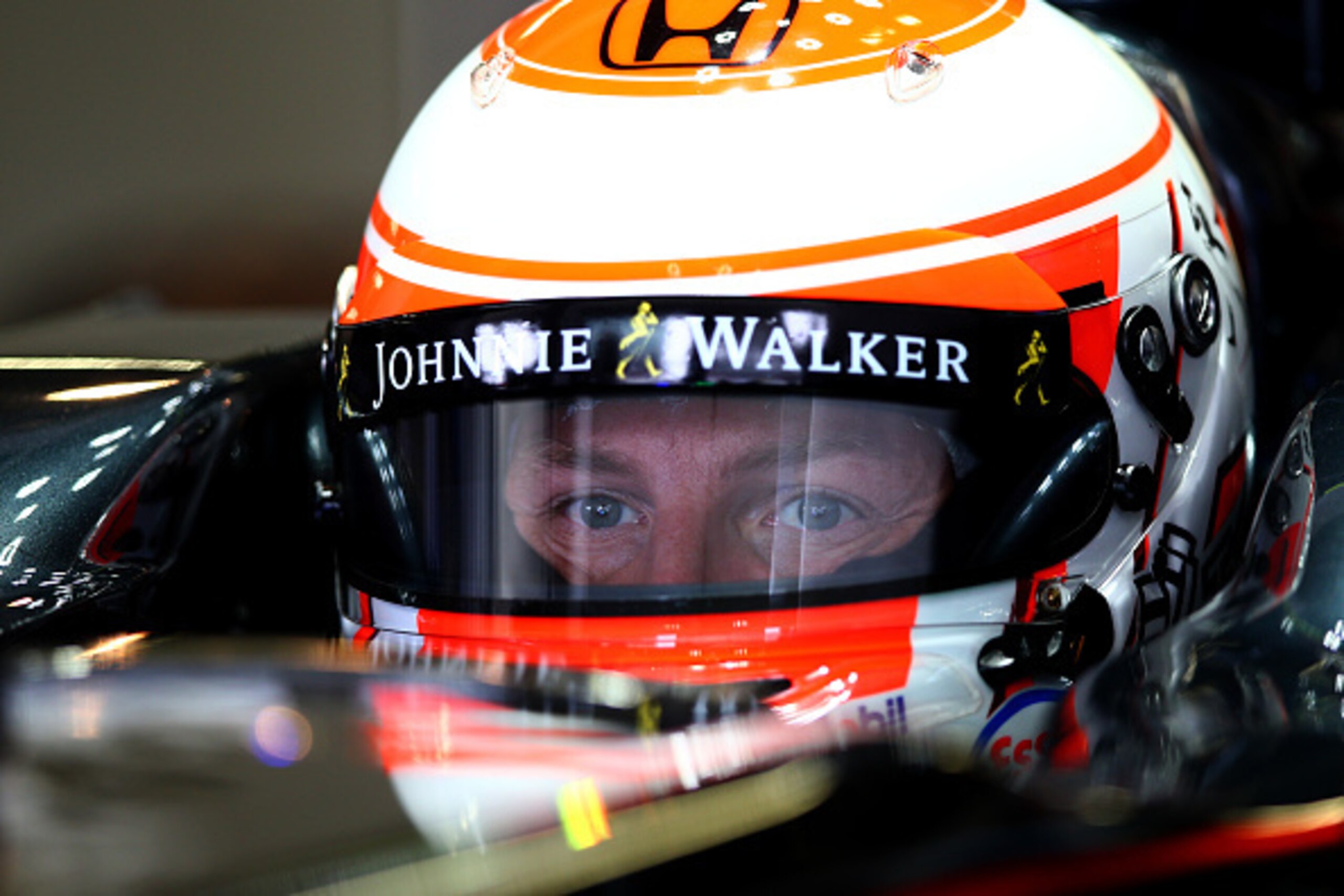 SUZUKA, JAPAN - SEPTEMBER 25:  Jenson Button of Great Britain and McLaren Honda sits in his car in the garage during practice for the Formula One Grand Prix of Japan at Suzuka Circuit on September 25, 2015 in Suzuka.  (Photo by Mark Thompson/Getty Images)