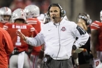Nov 7, 2015; Columbus, OH, USA; Ohio State Buckeyes head coach Urban Meyer watches a replay on the screen after a play against the Minnesota Golden Gophers at Ohio Stadium. Mandatory Credit: Greg Bartram-USA TODAY Sports