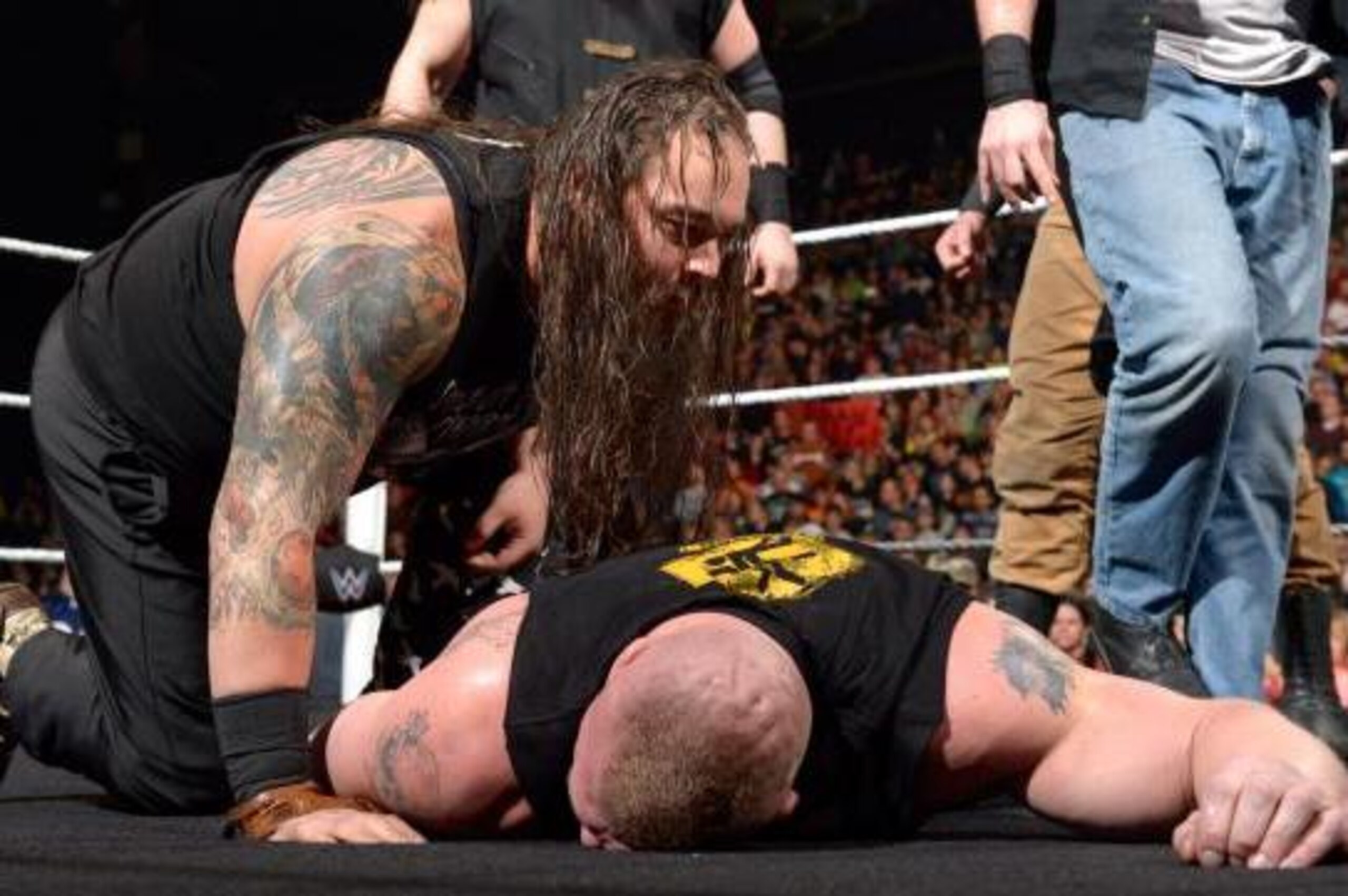 Bray Wyatt mocks a fallen Brock Lesnar.
