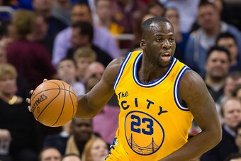 CLEVELAND, OH - JANUARY 18: Draymond Green #23 of the Golden State Warriors drives down court during the first half against the Cleveland Cavaliers at Quicken Loans Arena on January 18, 2016 in Cleveland, Ohio. NOTE TO USER: User expressly acknowledges an