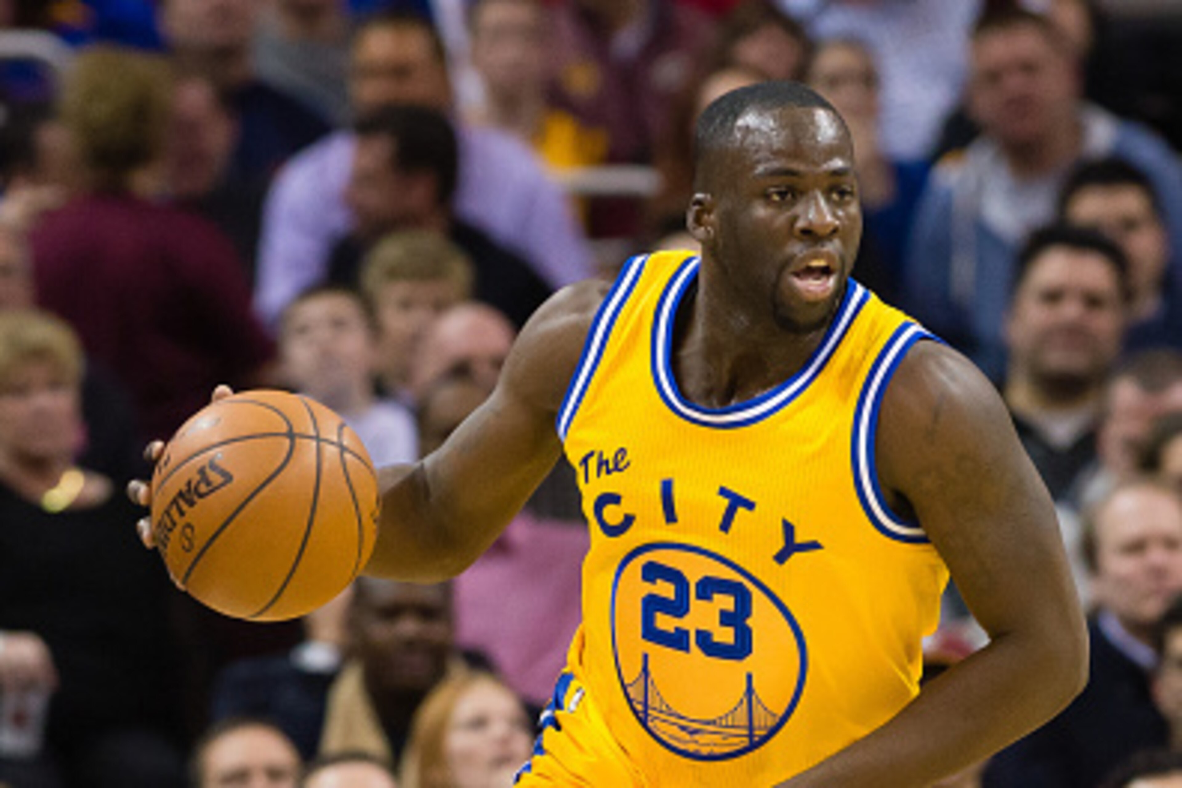 CLEVELAND, OH - JANUARY 18: Draymond Green #23 of the Golden State Warriors drives down court during the first half against the Cleveland Cavaliers at Quicken Loans Arena on January 18, 2016 in Cleveland, Ohio. NOTE TO USER: User expressly acknowledges an CLEVELAND, OH - JANUARY 18: Draymond Green #23 of the Golden State Warriors drives down court during the first half against the Cleveland Cavaliers at Quicken Loans Arena on January 18, 2016 in Cleveland, Ohio. NOTE TO USER: User expressly acknowledges an