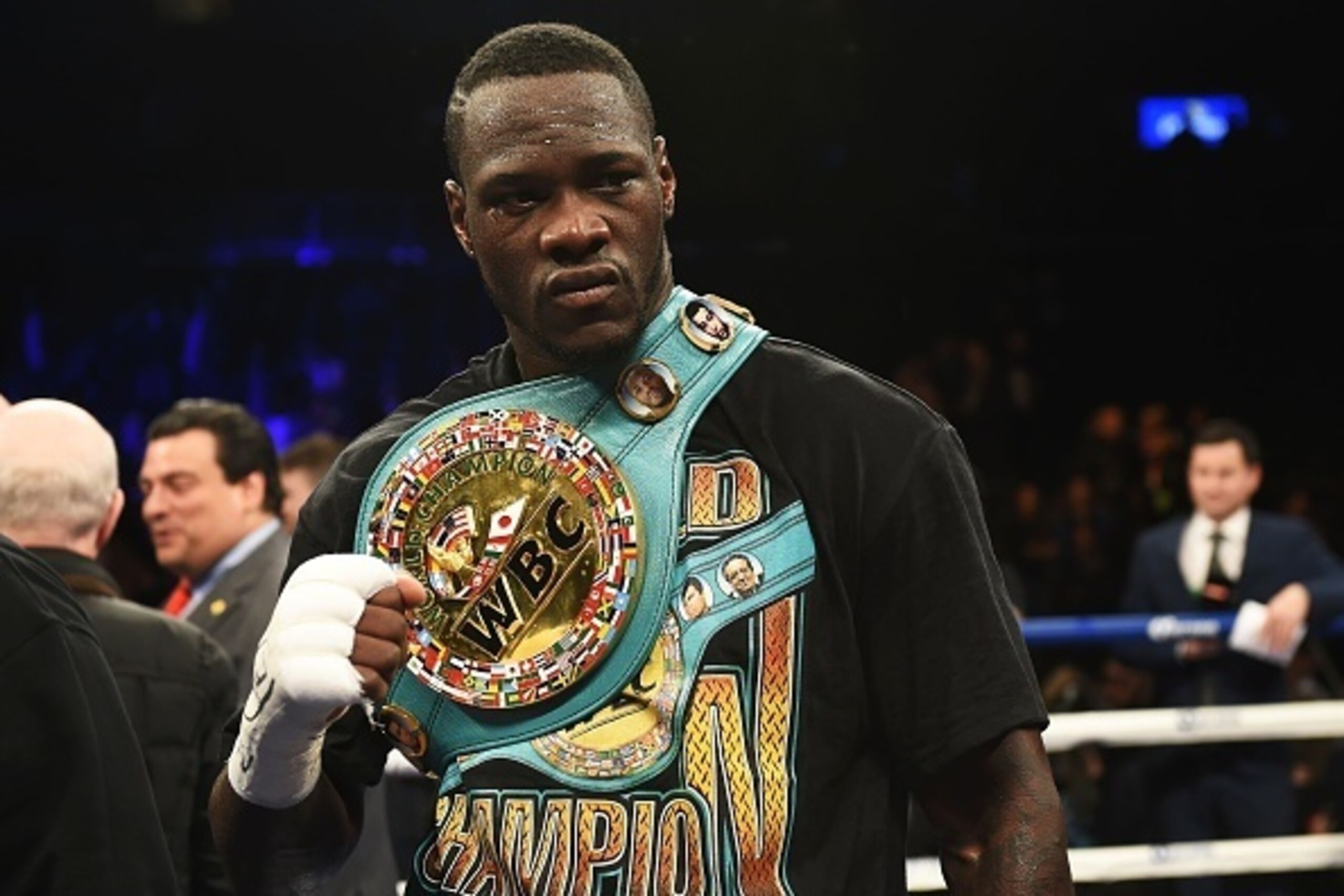 Deontay Wilder of the US celebrates defeating Artur Szpilka of Poland following their WBC Heavyweight Championship bout at Barclay's Center in Brooklyn, New York, on January 16, 2016. 
Wilder won via ninth round knock out.  / AFP / AFP PHOTO / DON EMMERT 