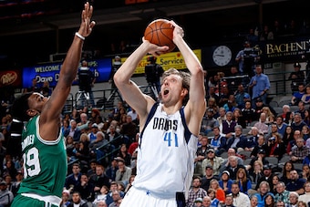 DALLAS, TX - JANUARY 18: Dirk Nowitzki #41 of the Dallas Mavericks shoots a jumper against the Boston Celtics on January 18, 2016 at the American Airlines Center in Dallas, Texas. NOTE TO USER: User expressly acknowledges and agrees that, by downloading a