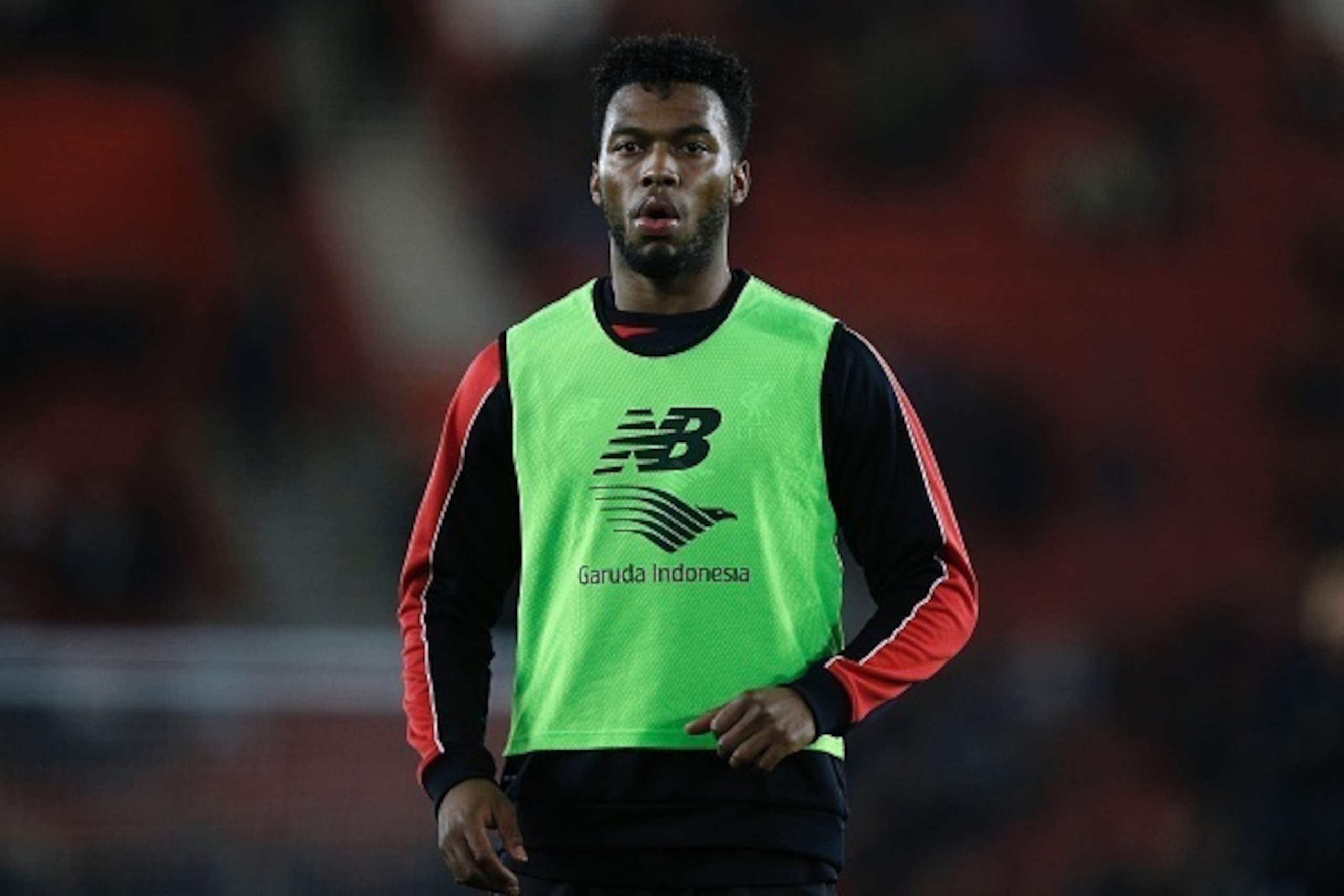 Liverpool's English striker Daniel Sturridge warms up with teammates ahead of the English League Cup quarter-final football match between Southampton and Liverpool at St Mary's Stadium in Southampton, southern England on December 2, 2015.  

RESTRICTED TO