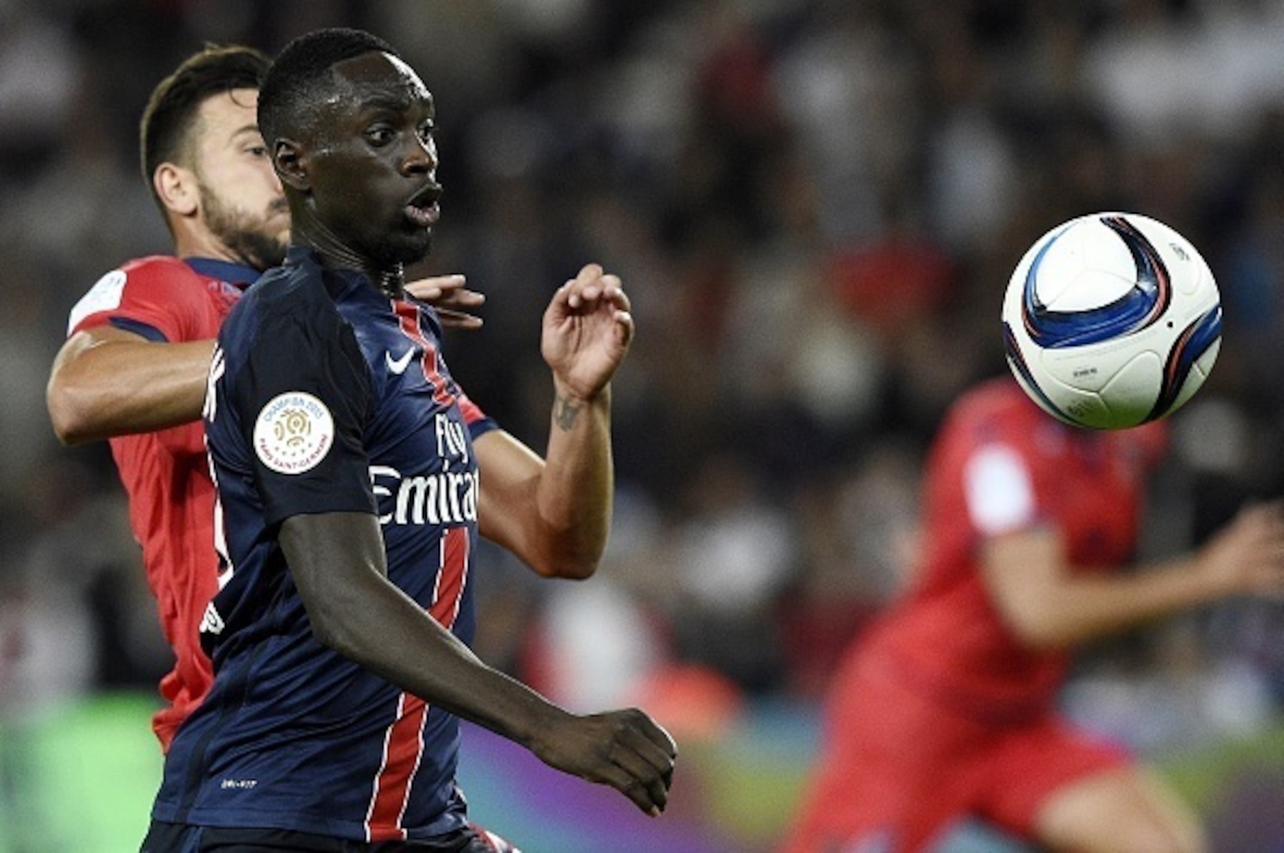 Paris Saint-Germain's French forward Jean Kevin Augustin vies for the ball during the French L1 football match between Paris Saint-Germain (PSG) and GFC Ajaccio on August 16, 2015 at the Parc des Princes stadium in Paris. Paris won 2-0.AFP PHOTO / FRANCK 