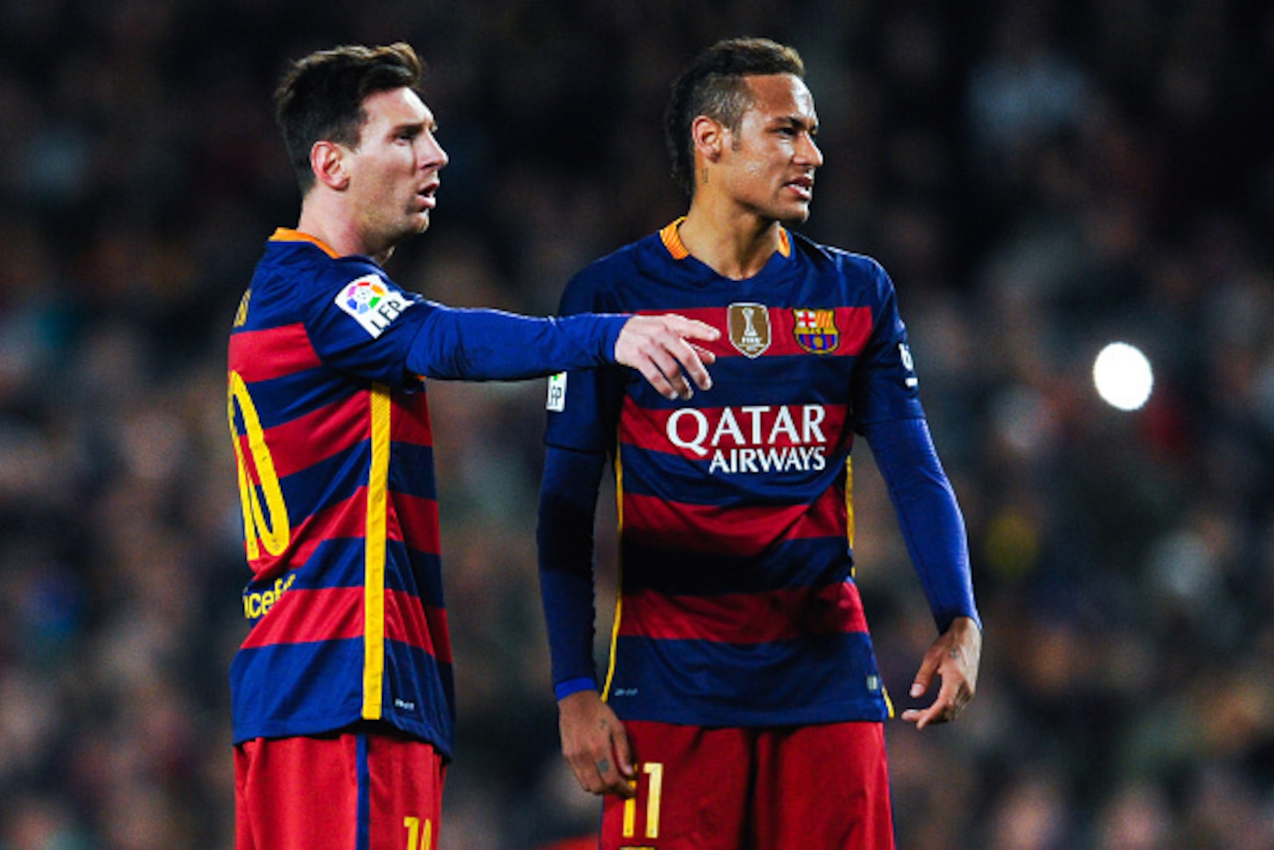 BARCELONA, SPAIN - JANUARY 17:  Lionel Mess and Neymar of FC Barcelona stand next to the ball before taking a free kick during the La Liga match between FC Barcelona and Athletic Club de Bilbao  at Camp Nou on January 17, 2016 in Barcelona, Spain.  (Photo